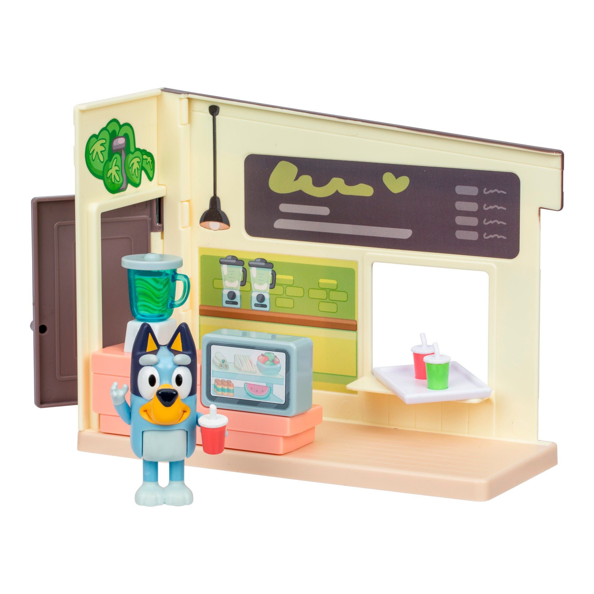 Toy set with a character holding a drink in front of a miniature coffee shop.