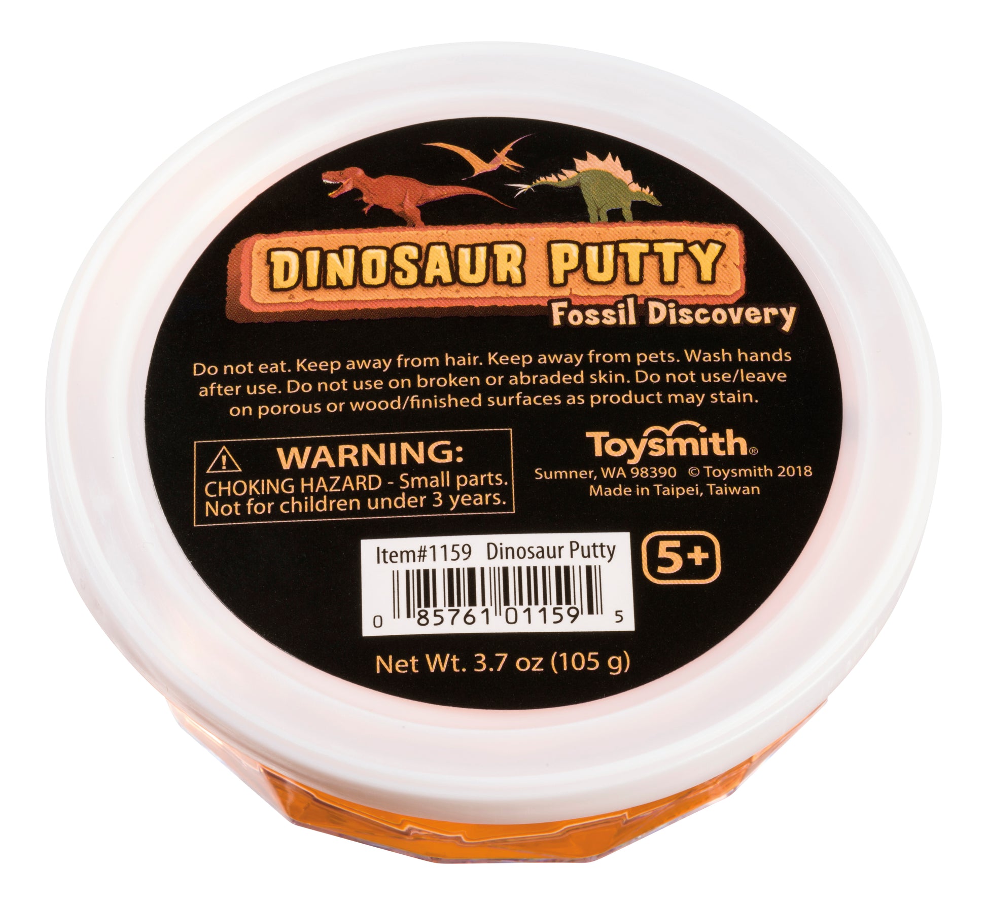 A round container labeled “Toysmith Colorful Dinosaur Fossil Putty” features dinosaur illustrations on the lid with safety warnings: “Choking Hazard” and “Not for children under 3 years.”.