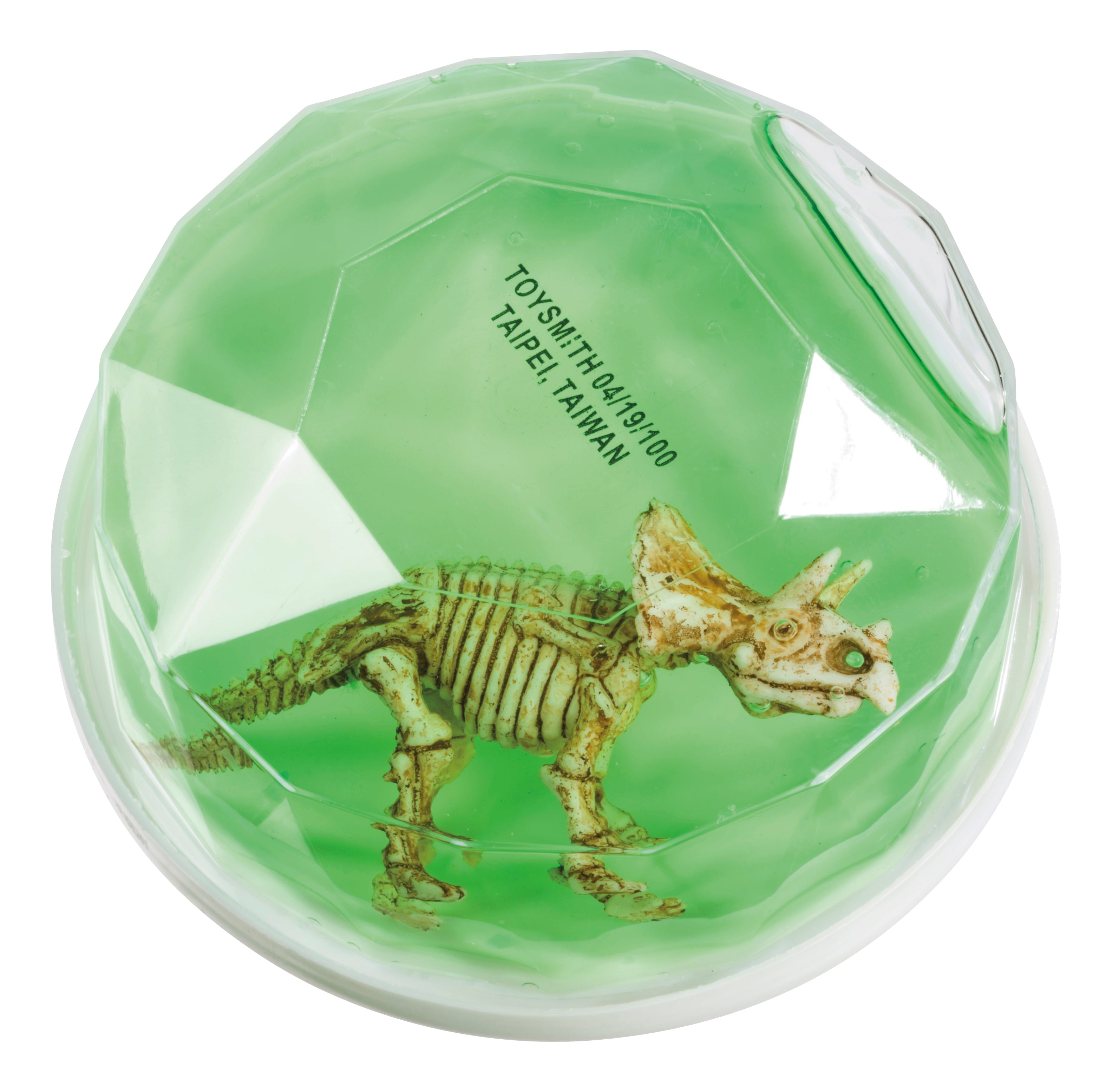 The Toysmith Colorful Dinosaur Fossil Putty by Toysmith features a small plastic triceratops skeleton model in a translucent green, faceted sphere, with printed text on the container.