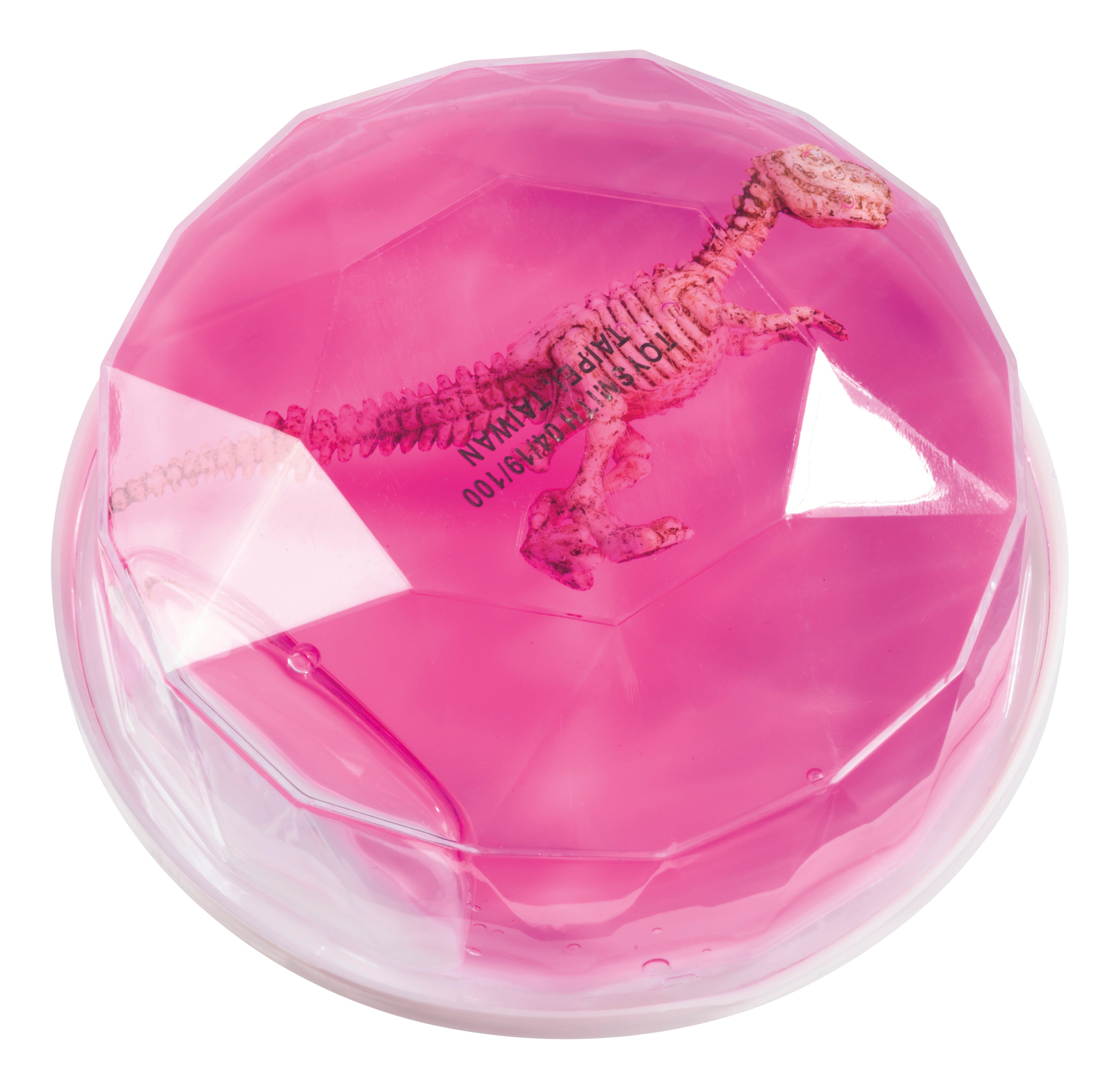 The Toysmith Colorful Dinosaur Fossil Putty by Toysmith features a small plastic dinosaur skeleton encased in a faceted pink gem-shaped container with a white base.