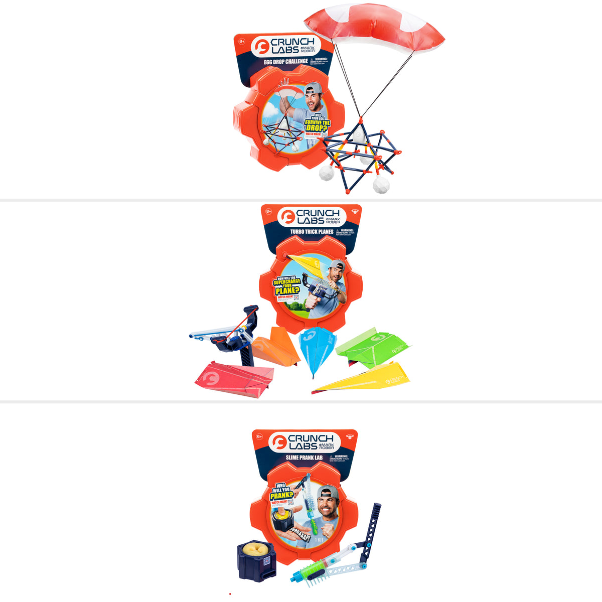 Three Crunch Lab Crunch Kits Single Pack Assortment by Moose Toys, inspired by Mark Rober: one featuring a parachute toy, one with paper planes and a launcher, and one including building pieces and a measuring tape—each in vibrant orange packaging showcasing a child and the signature CrunchLabs logo.
