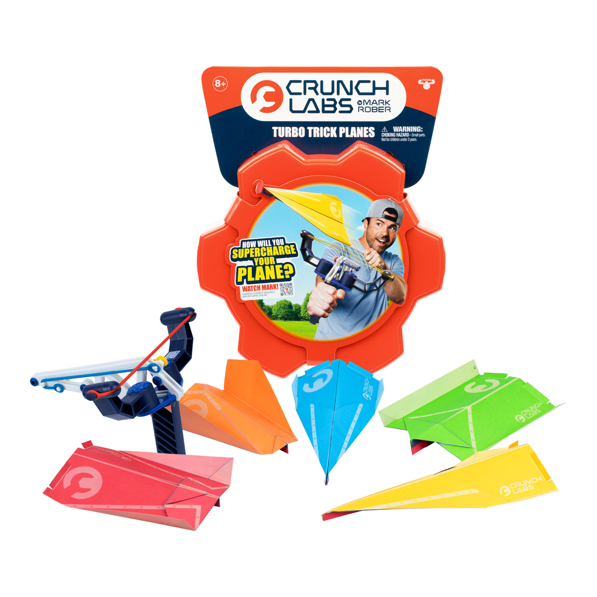 The Moose Toys Crunch Labs Crunch Kit Turbo Trick Flyer is an exciting STEM toy that includes a launcher and five colorful paper planes in red, yellow, blue, orange, and green. The packaging of this kit features a person aiming the launcher, with prominent Moose Toys branding and product details clearly visible.