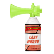 The Say Whaaaaat?! Mini Air Horns Trois by Say Whaaaaat?! features a green can with a comic-style label screaming “SAY WHAAAAAAT?! LAST NERVE” and bold red-orange sound effect graphics in the background.
