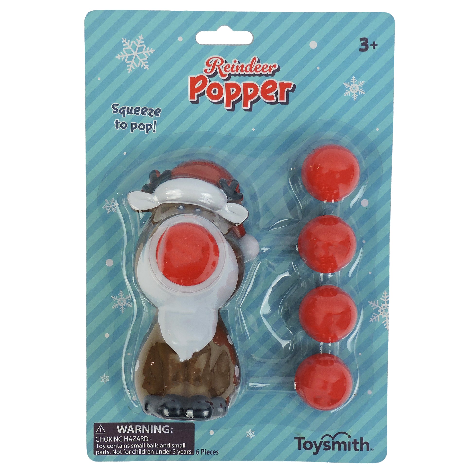 The Toysmith Reindeer Ball Popper is a red-nosed reindeer in a Santa hat with four red foam balls—ideal as a stocking stuffer. Packaging says "Reindeer Ball Popper" and "Squeeze to pop!" with snowflake designs.