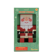 The Toysmith Holiday Wood Fidget is a wooden Santa Claus puzzle in a green, snowflake-adorned box labeled "Wood Fidget Puzzle." Ideal as a stocking stuffer, the packaging warns it's not for kids under 3.