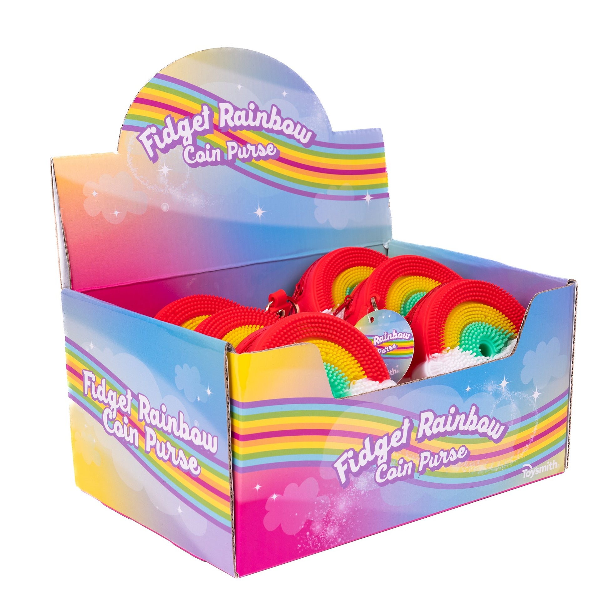 A Toysmith display box labeled "Fidget Rainbow Coin Purse & Key Chain" holds several round, rainbow-colored pop-it texture purses that double as keychains. The box is decorated with rainbows, clouds, and stars.