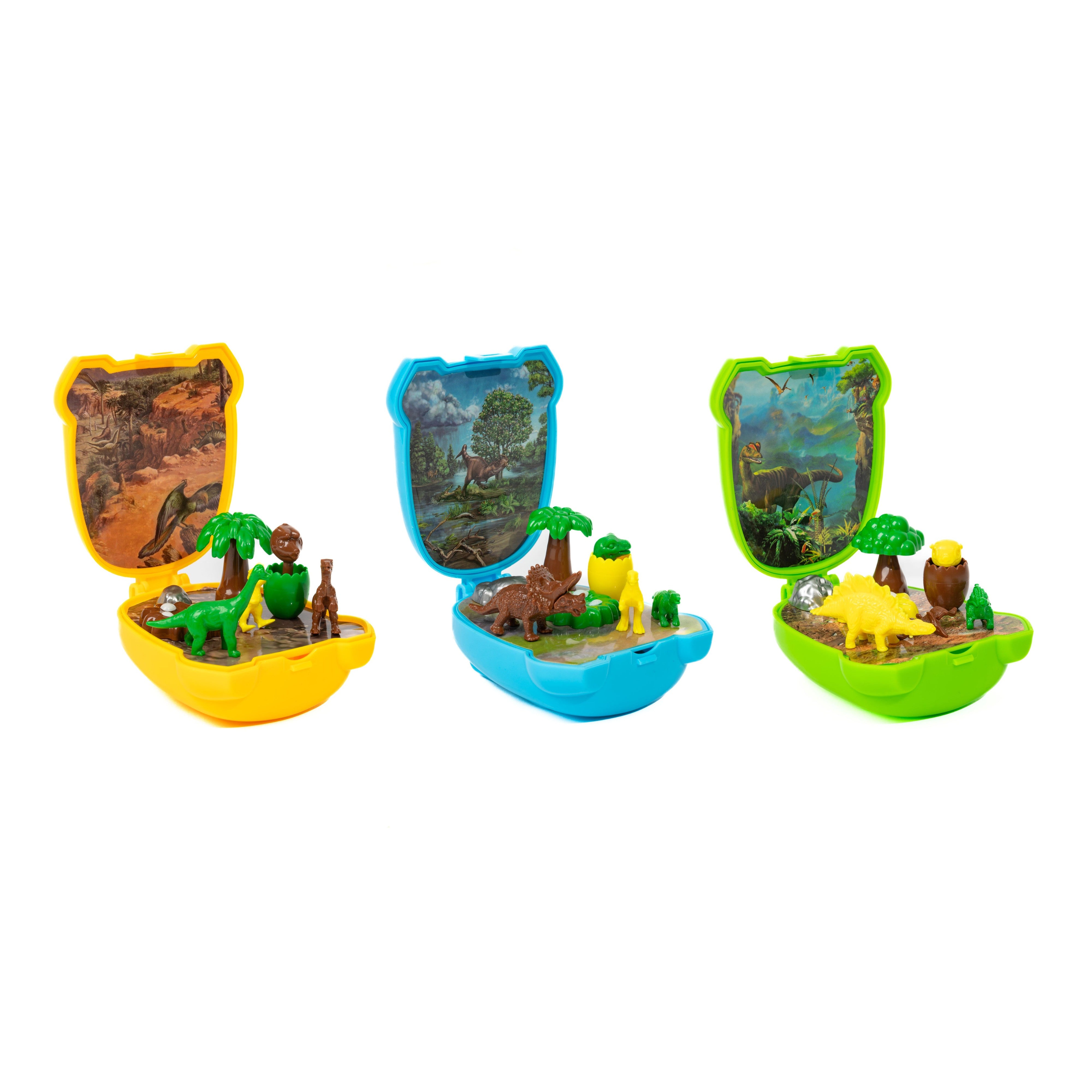 Toysmith Dinosaur Mini Worlds includes three miniature dino figurine playsets in yellow, blue, and green cases, each opening to reveal dinosaur figures, trees, and prehistoric scenery backgrounds.