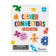 A Toysmith Clever Connectors Building Blocks Box Set blind box with colorful blocks, a cat figure, age 5+ label, collect all 6 sets notice, and a choking hazard warning.