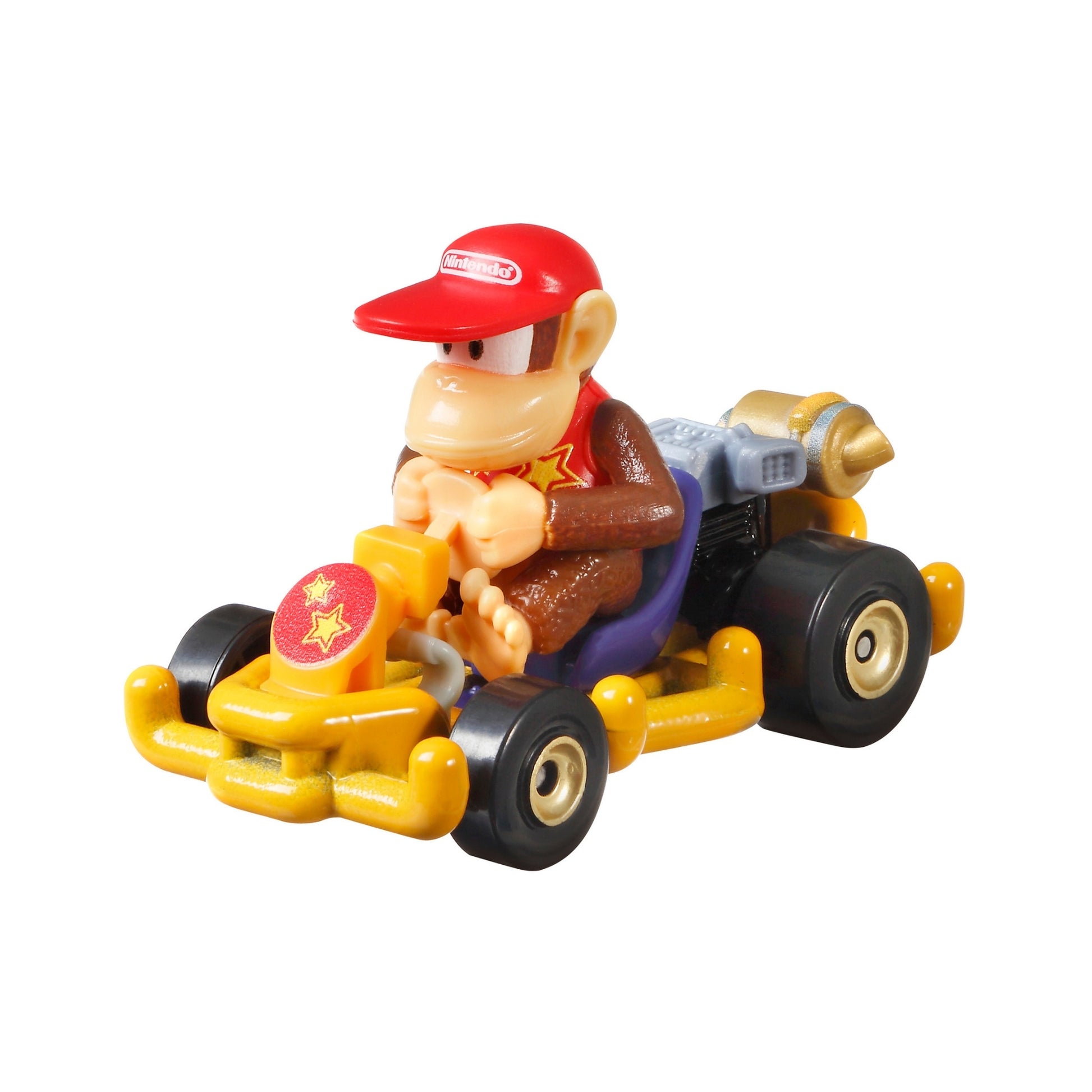 The Mattel Hot Wheels Mario Kart Replica Die Cast Vehicle features a monkey character in a red cap and brown jacket, seated in a yellow and black go-kart with star decals and a small rear engine.