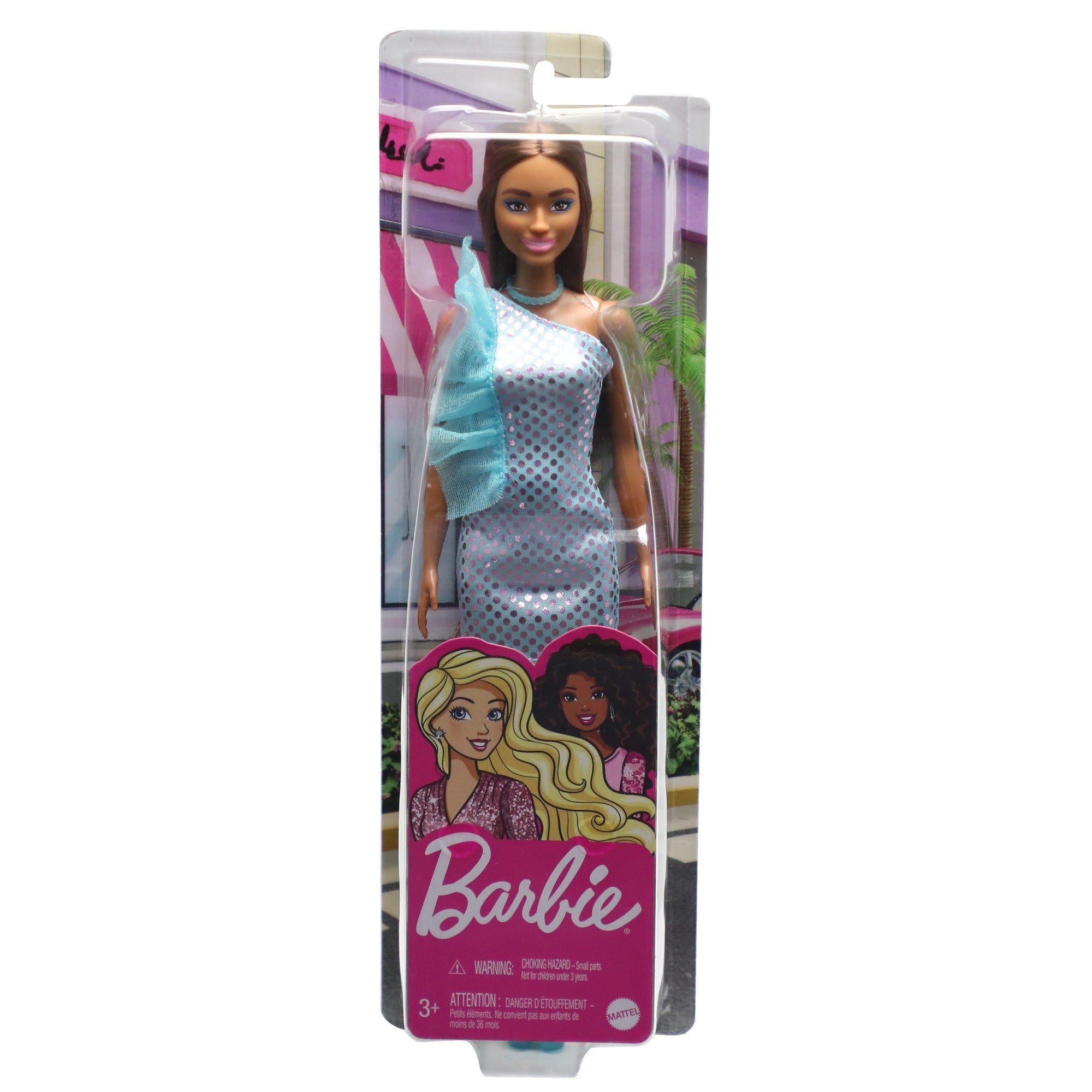 The Mattel Barbie Glitz Doll wears a blue polka dot one-shoulder dress, comes in a clear box with Barbie branding and character illustrations, and is perfect for fashion doll fans ages 3+.