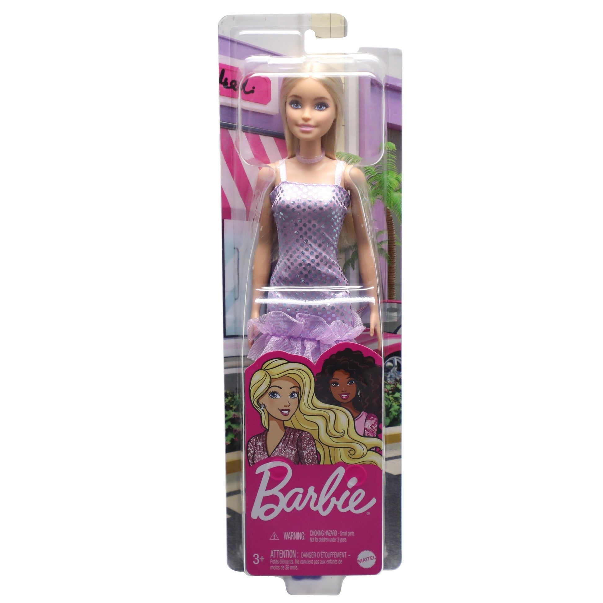 The Mattel Barbie Glitz Doll is shown in its packaging, wearing a purple dress. The box displays two fashion dolls, the Barbie logo at the bottom, and a pink building with palm trees in the background.