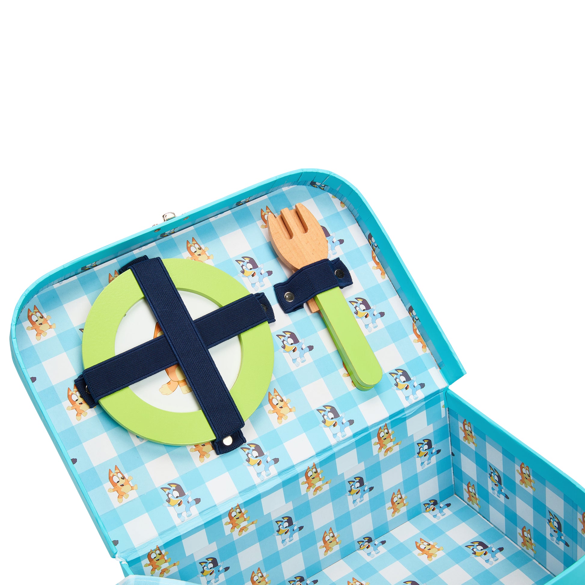 Children's lunchbox with checkered pattern and cartoon characters, containing a green plate, blue fork, and orange spoon.