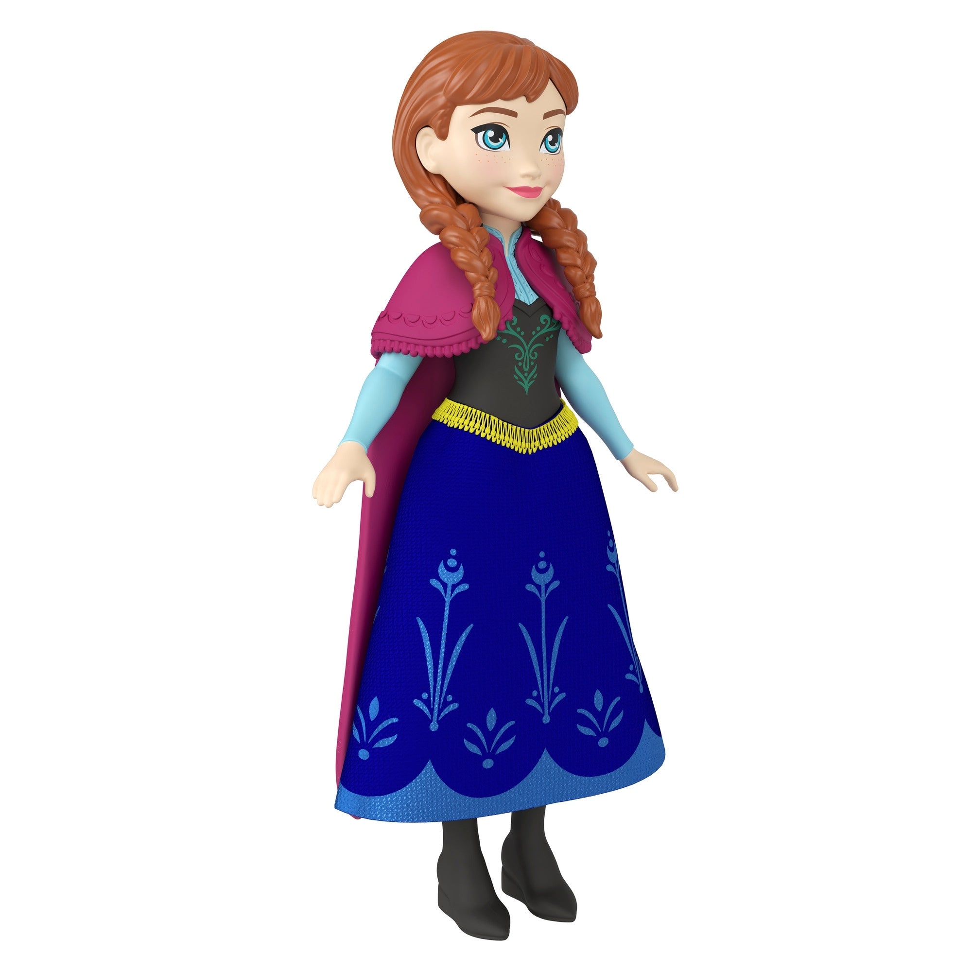 The Mattel Small Frozen Doll features red braided hair, a blue floral dress, black bodice, pink cape, and black boots—standing upright against a white background. Perfect for fans of Elsa and Anna!.