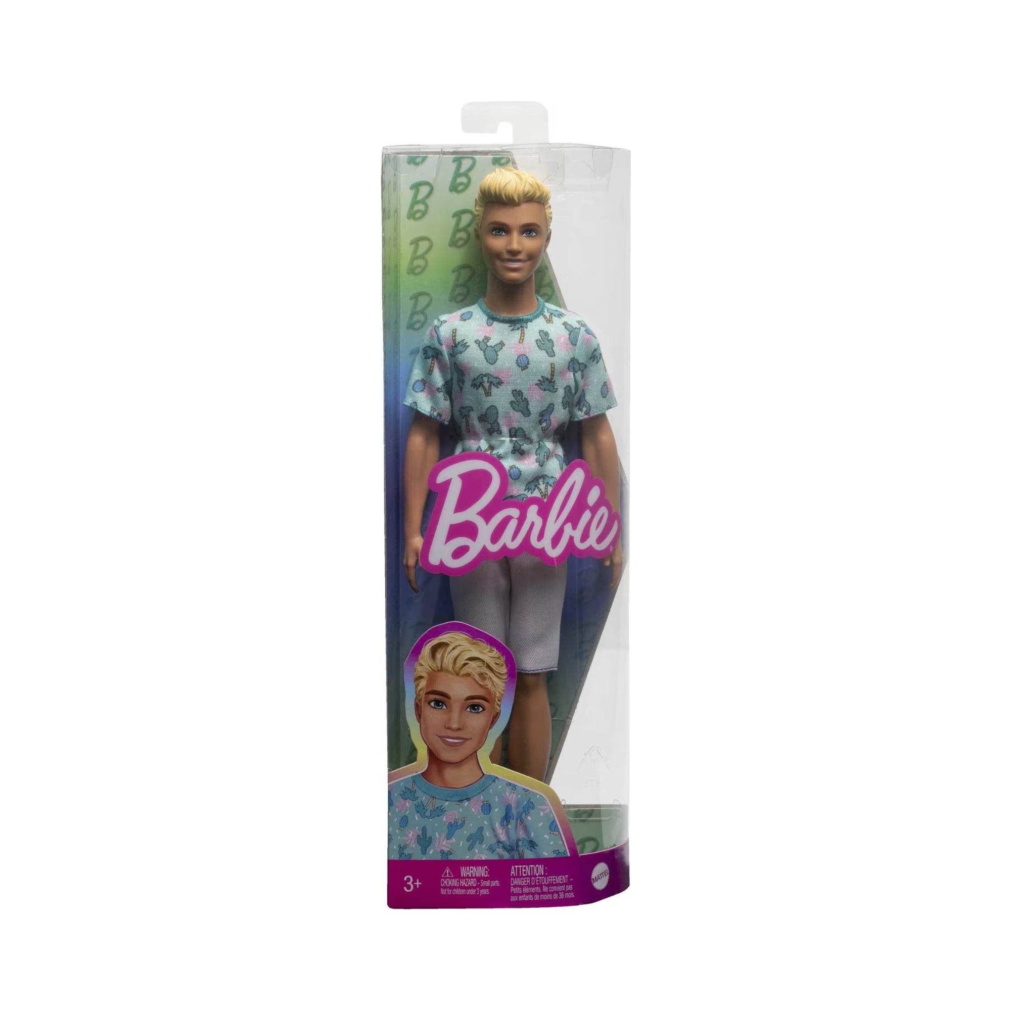 The Mattel Barbie Ken Fashionistas Doll wears a pastel-patterned shirt and gray shorts, displayed in a clear Barbie-branded box with cartoon art and a teal-green "B" pattern in the background.