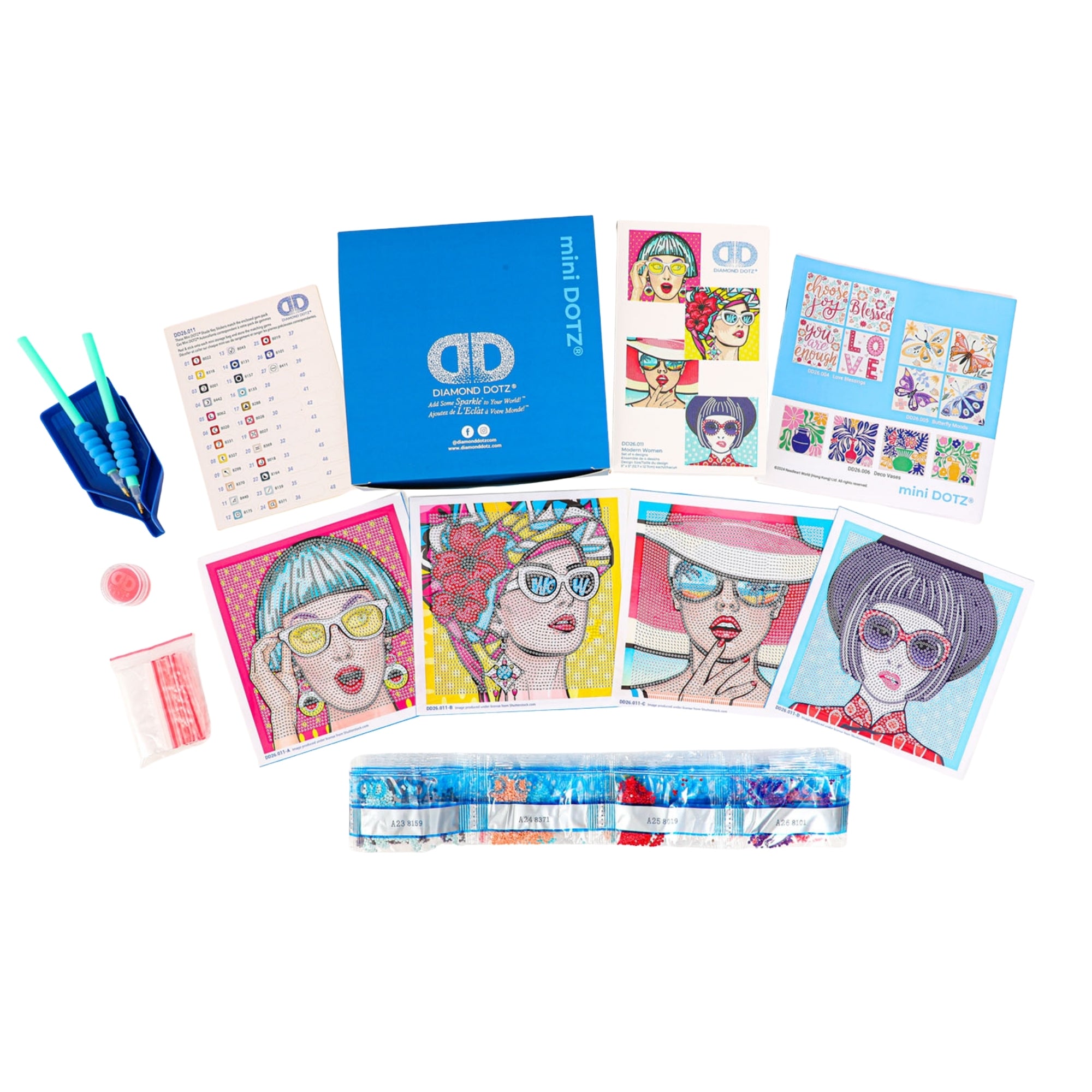 The Diamond Dotz Mini Dotz kit includes tools, colored diamonds, instruction sheets, and four art cards showing stylish women in sunglasses and hats, all displayed on a white background.