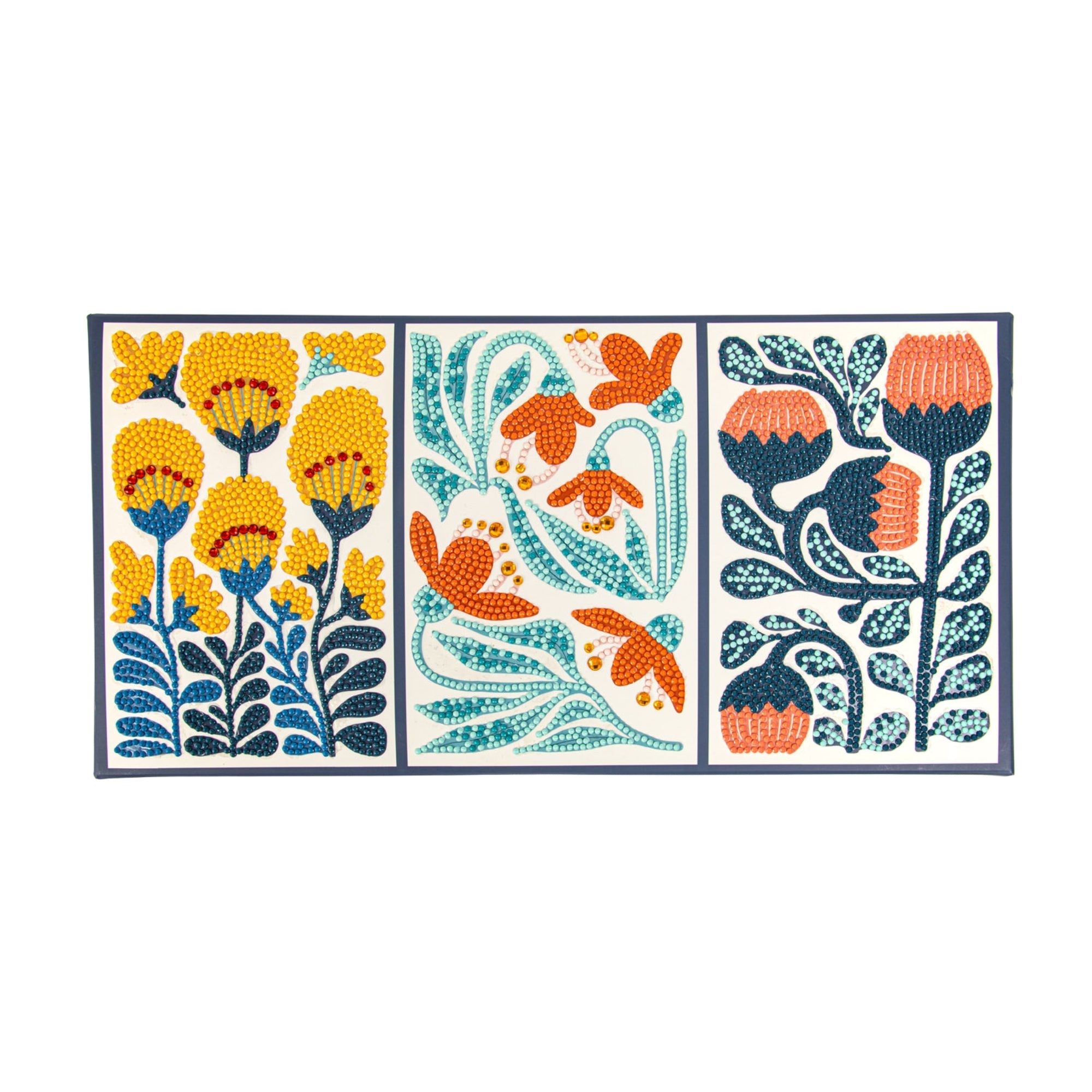 The Diamond Dotz Small Dotz Decor is a rectangular, three-panel artwork with stylized floral designs in yellow, orange, teal, and navy blue on a white background.