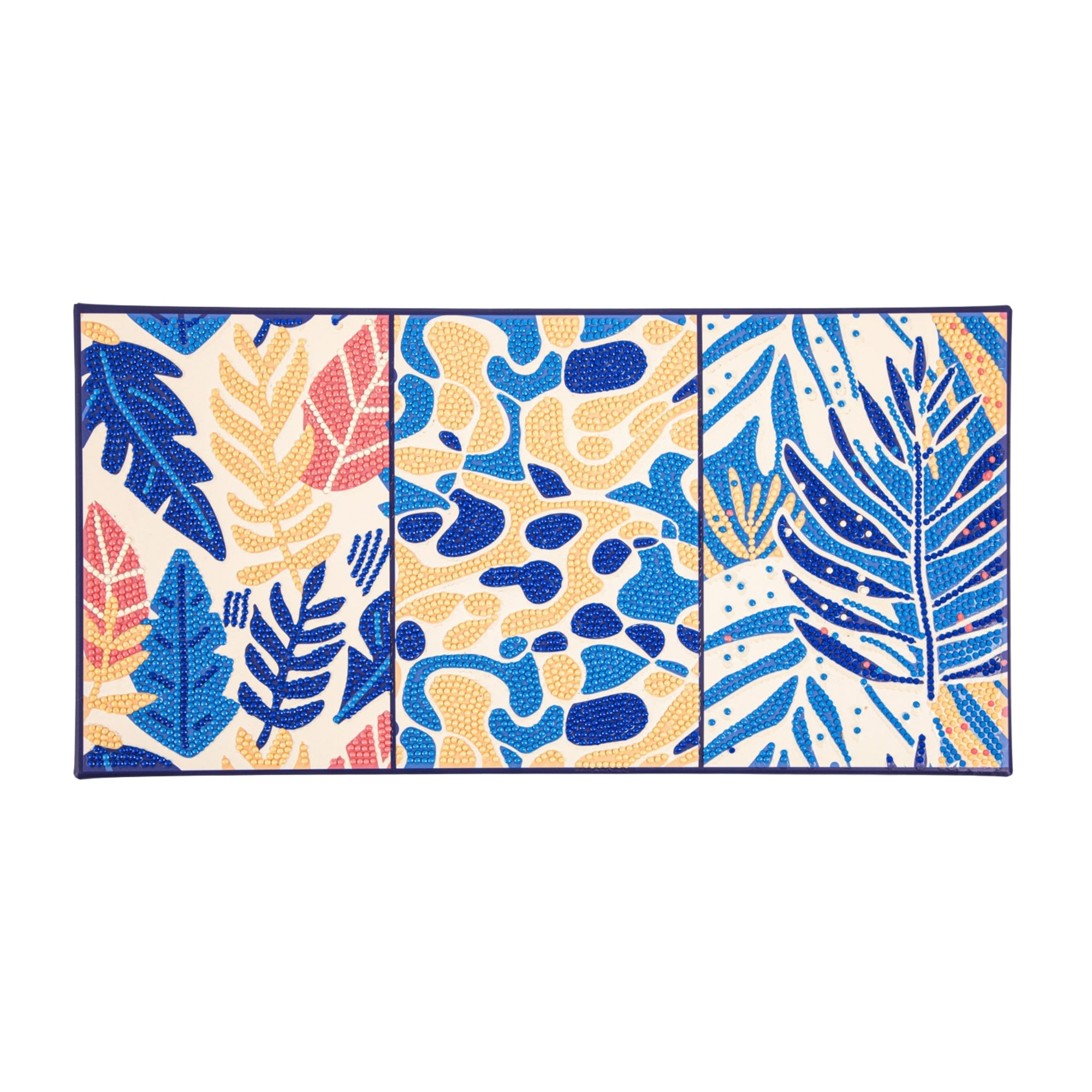 The Diamond Dotz Small Dotz Decor is a rectangular mat with three sections, each showing abstract patterns in blue, yellow, and coral. It features overlapping leaves and organic shapes with dotted details on a white background.