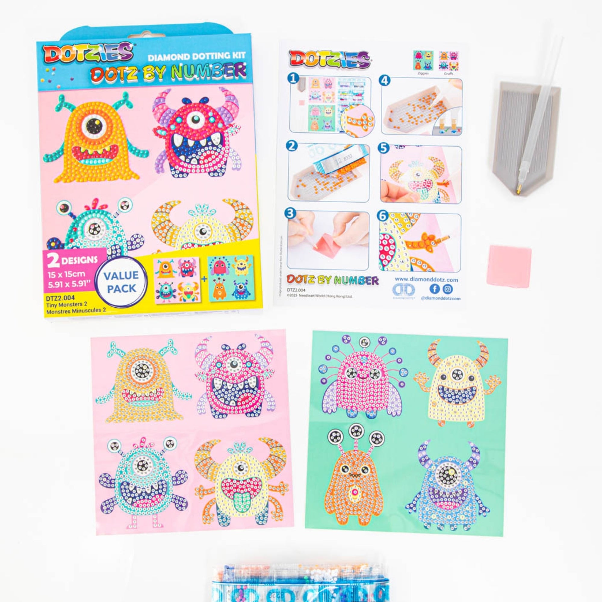 The Diamond Dotz Dotz By Number kit is shown with a vibrant box, instructions, tools, and four cartoon monster designs featuring numbered dots to fill with sparkling gem-like beads.