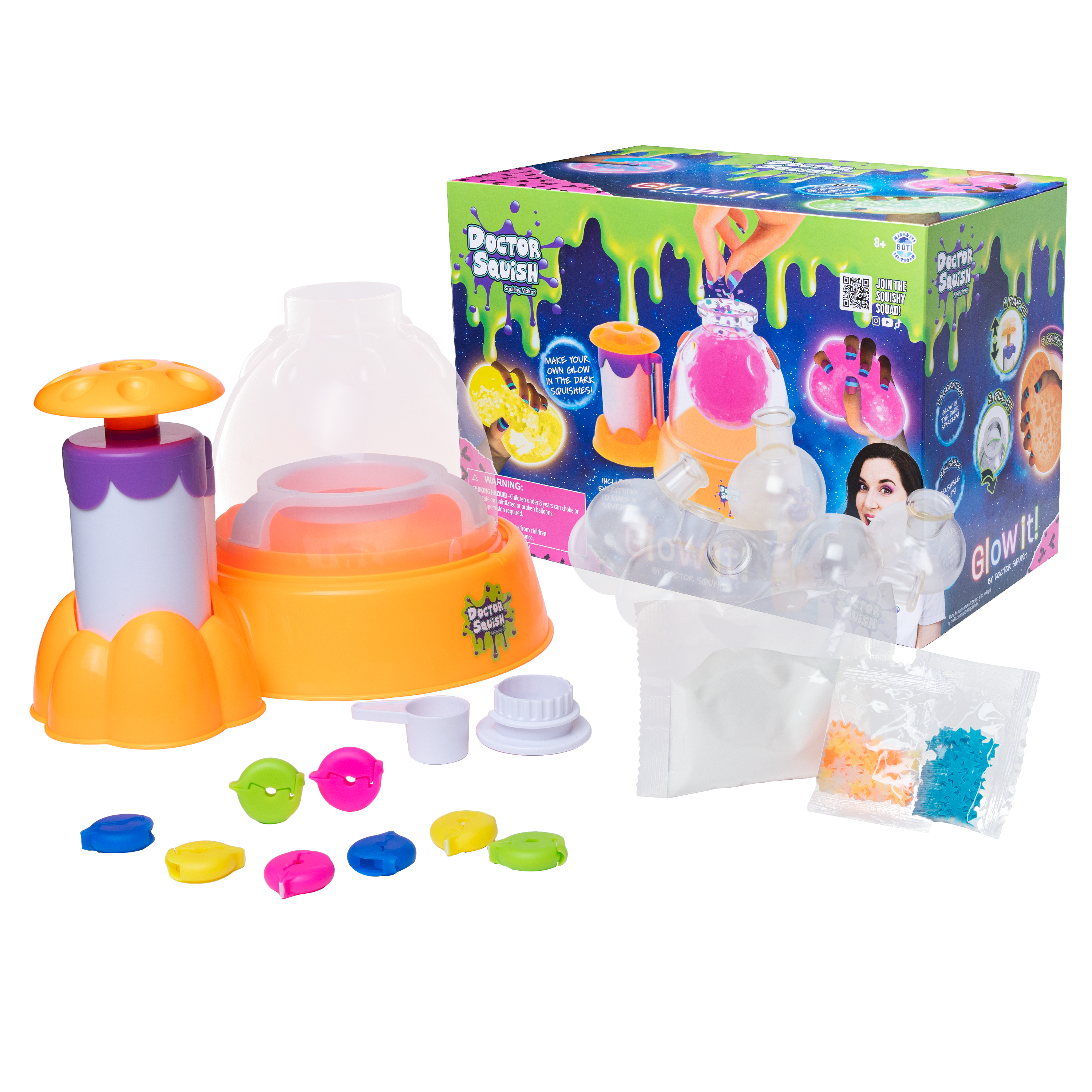The Dr Squish Squishy Maker Station, Glow It Edition, is shown with its box, a round orange and purple station, clear domes, colorful parts, slime packets, and accessories—everything needed to make your own glow-in-the-dark squishies.