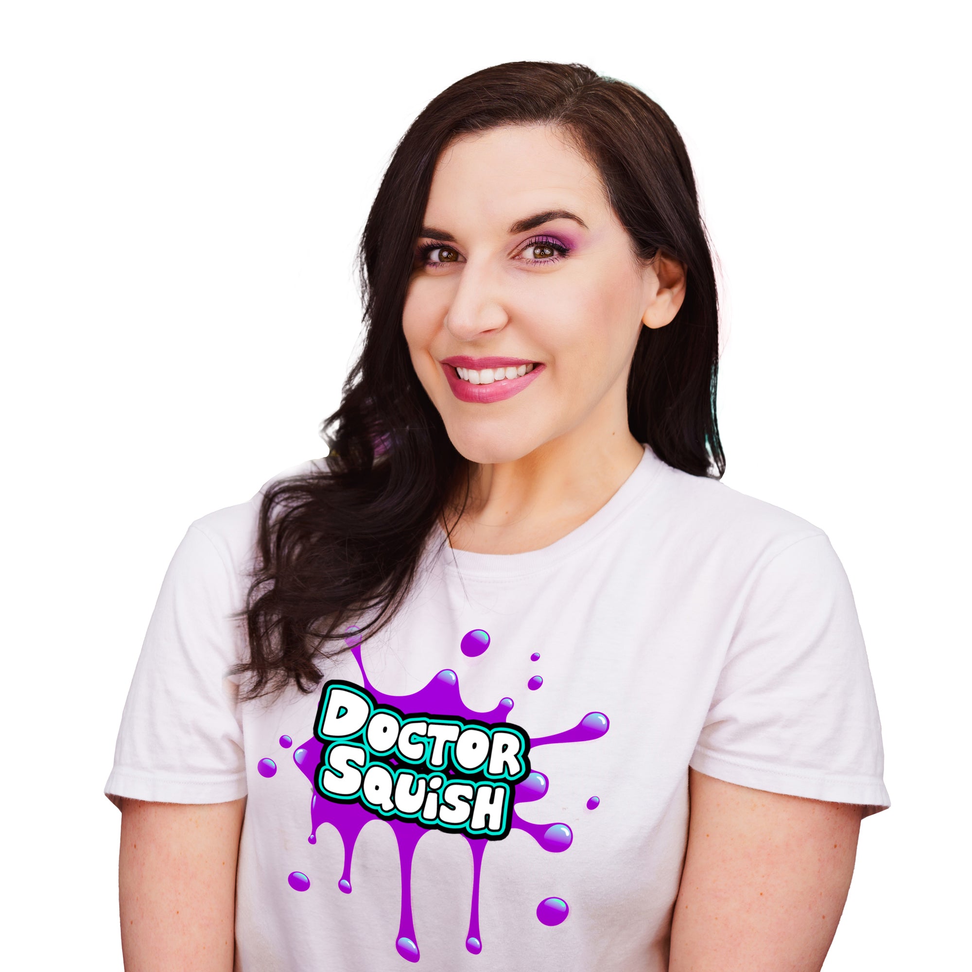 A smiling woman with long dark hair wears a white t-shirt featuring playful squishy characters, a purple splatter design, and "Doctor Squish" text, posing in front of a plain white background. She promotes the Doctor Squish Putty Buddies Asst. 21ct CDU.