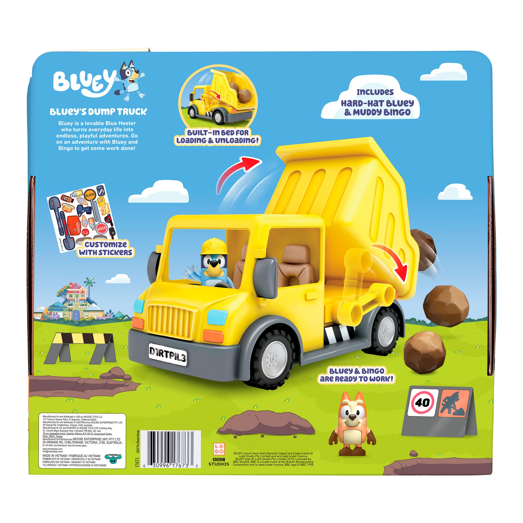 The image shows the back of a Bluey Dump Truck package, featuring the yellow dump truck, a Hard-Hat Bluey figure, and a Muddy Bingo figure. The background displays rocks and a construction scene.