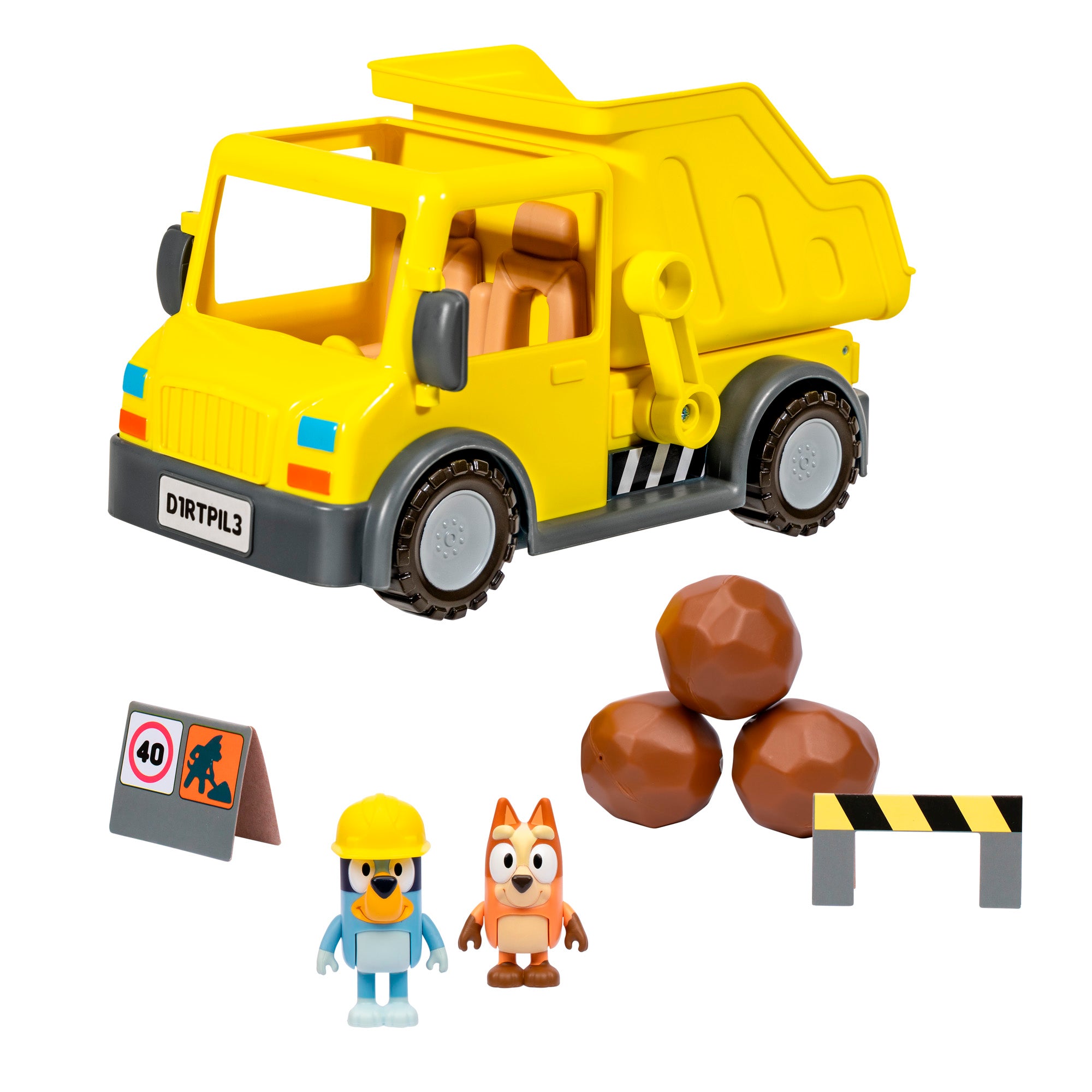 The Bluey Dump Truck is shown in yellow with two character figures, three brown rocks, a construction barrier, and a road sign displaying a speed limit symbol.