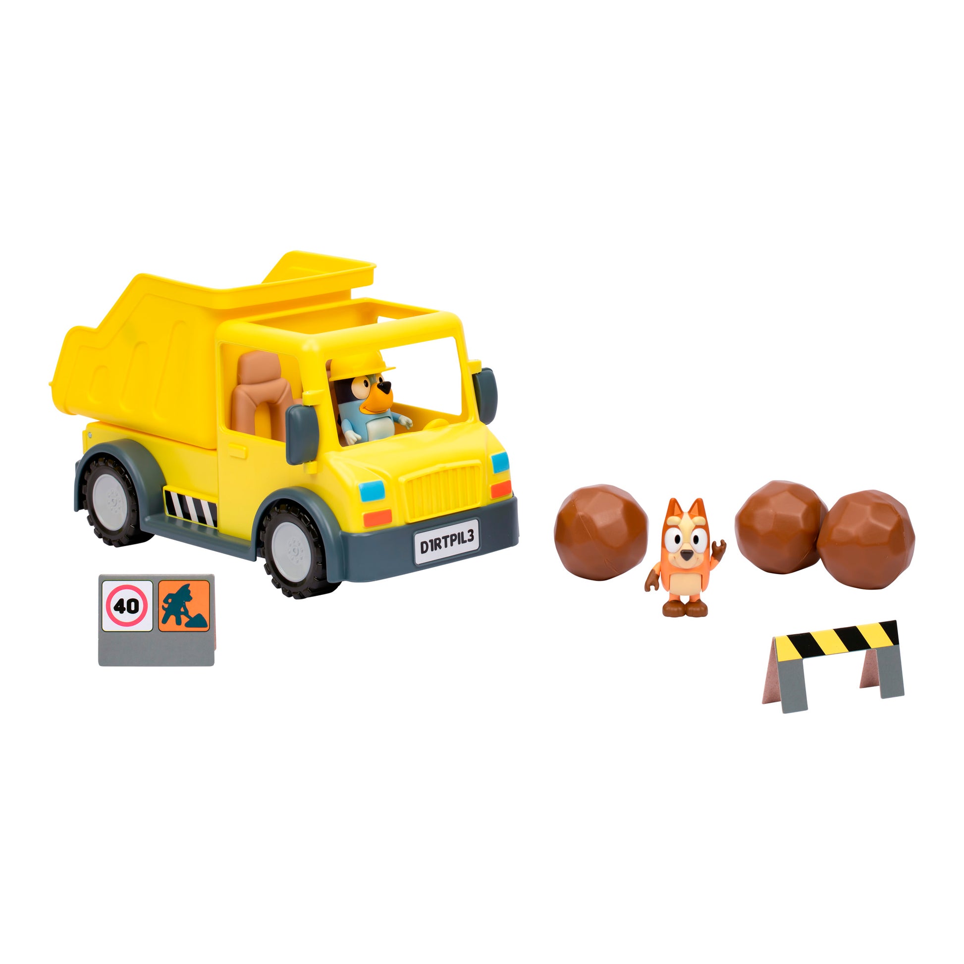 The Bluey Dump Truck set includes a yellow toy dump truck with a dog driver, a small dog figure, four brown boulders, a speed limit sign, and a black-and-yellow barrier displayed on a white background.