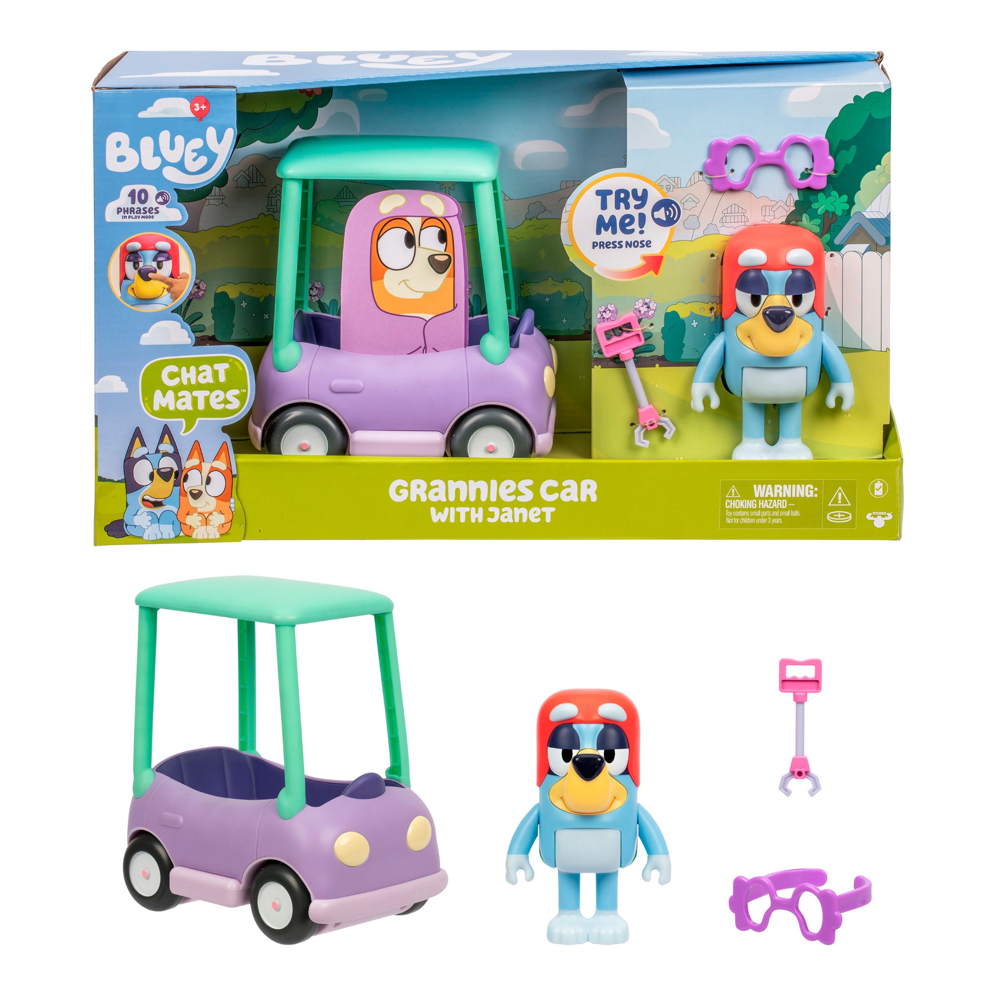 The Bluey Chat Mates Janet Playset includes a purple and green toy car, a Janet figure with red helmet and pink glasses, a key, glasses, fun Bluey-themed packaging, and a Try Me button.