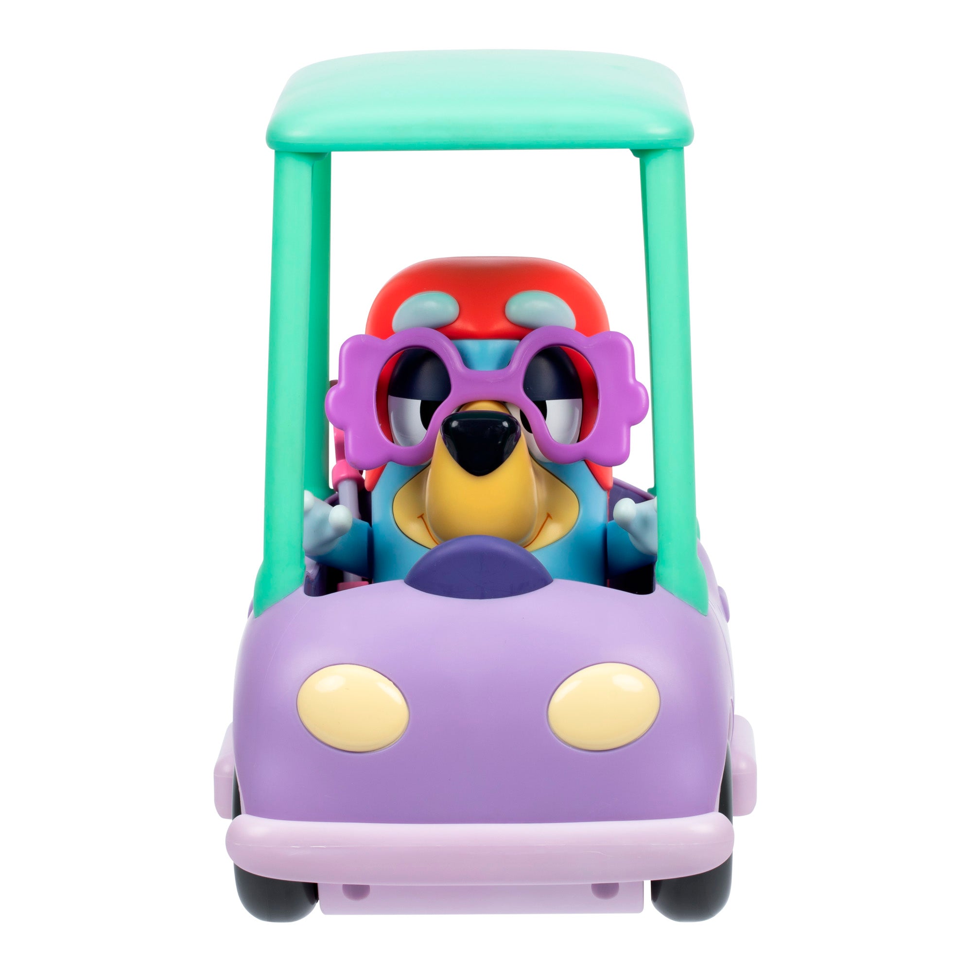 The Bluey Chat Mates Janet Playset features a cartoon dog in pink flower glasses sitting in a pastel toy car with a purple body, green roof, and red seat, facing forward.