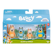 Packaged toy figures of Bluey and family characters with blue sky and cloud design.
