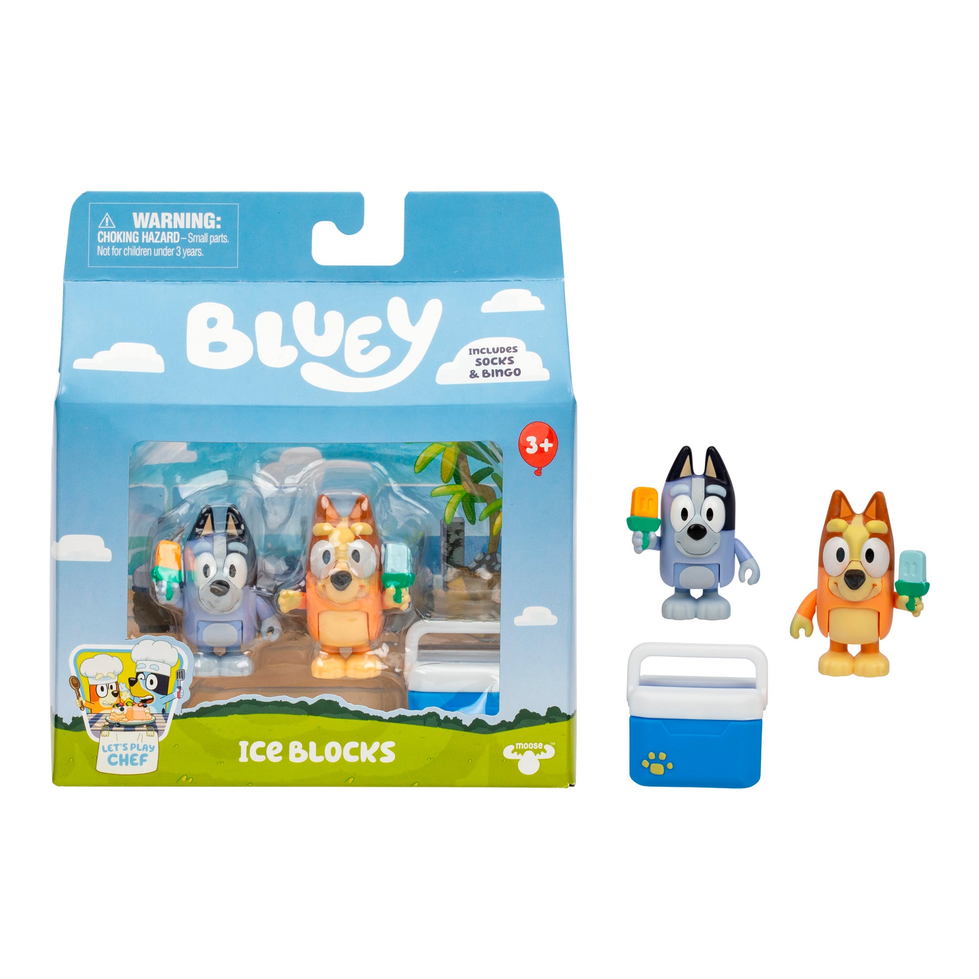 The Bluey Ice Blocks Figure Set 2-Pack includes Bingo and Socks figures (gray and orange) holding ice blocks, plus a small cooler accessory. Packaged for ages 3+, this set is labeled “Bluey Ice Blocks.”.