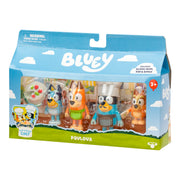 The Bluey Let’s Play Chef Pavlova 4-Pack Figure Set comes in blue packaging with cartoon artwork and includes Bluey, Mum, Dad, Bingo figures, and a pavlova dessert. Labeled "Let's Play Chef," it's suitable for ages 3 and up.