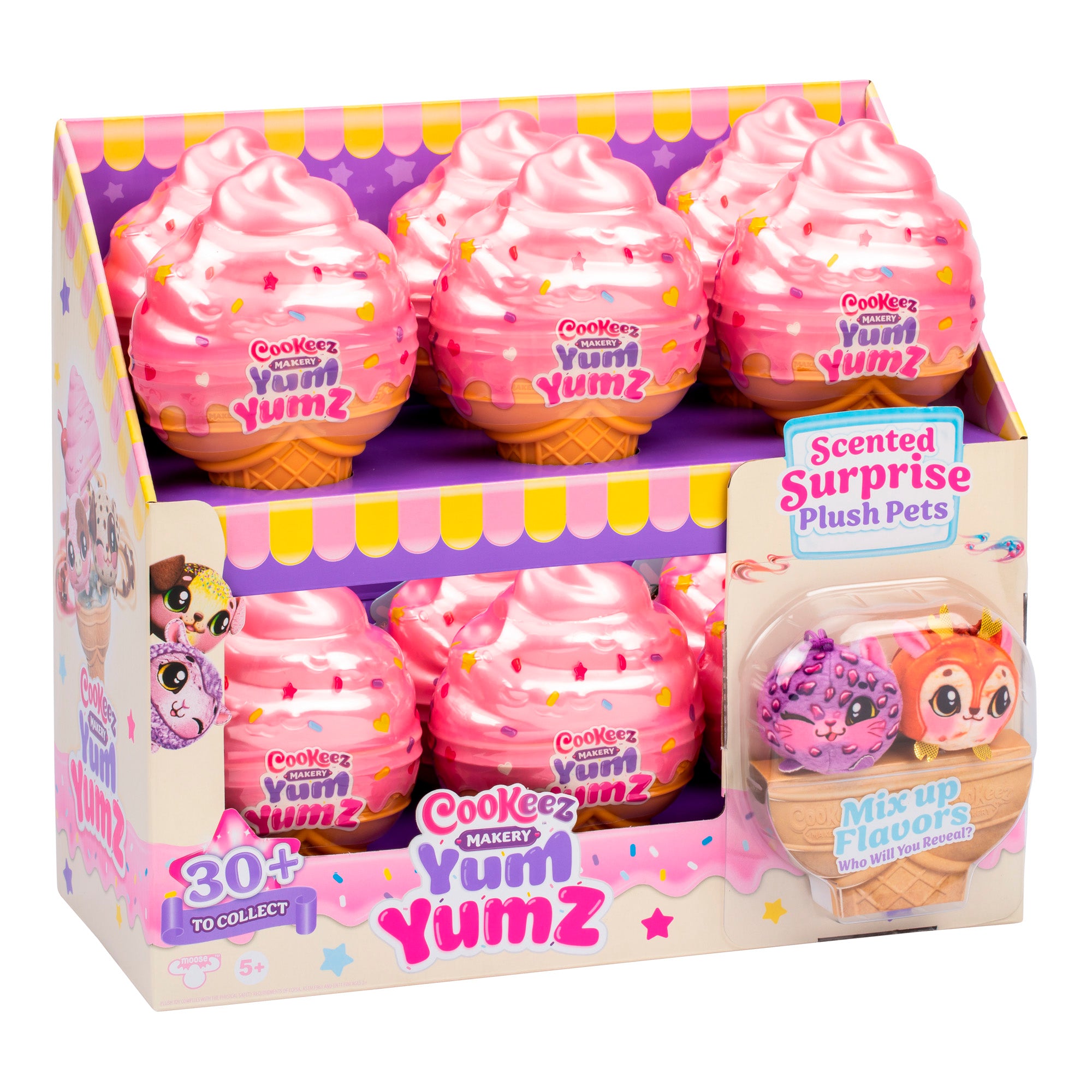 The Cookeez Makery Yum Yumz 2 Pack features pink cupcake-shaped containers with swirled frosting tops, each hiding scented surprise plush pets. There are over 30 to collect, as highlighted on the packaging.