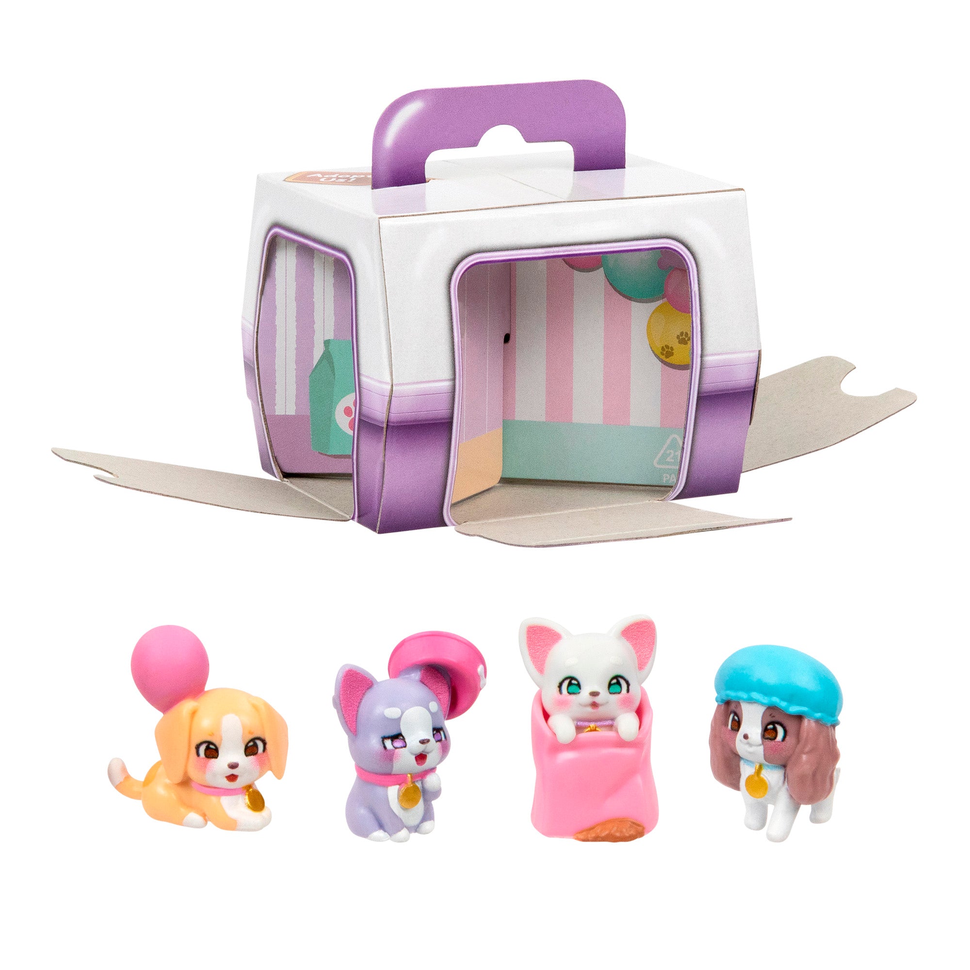 Four toy animals from the LLP Mama Surprise Families Adoption Pack are lined up in front of a cardboard pet carrier box with a handle and open door, showing its playful pastel interior.