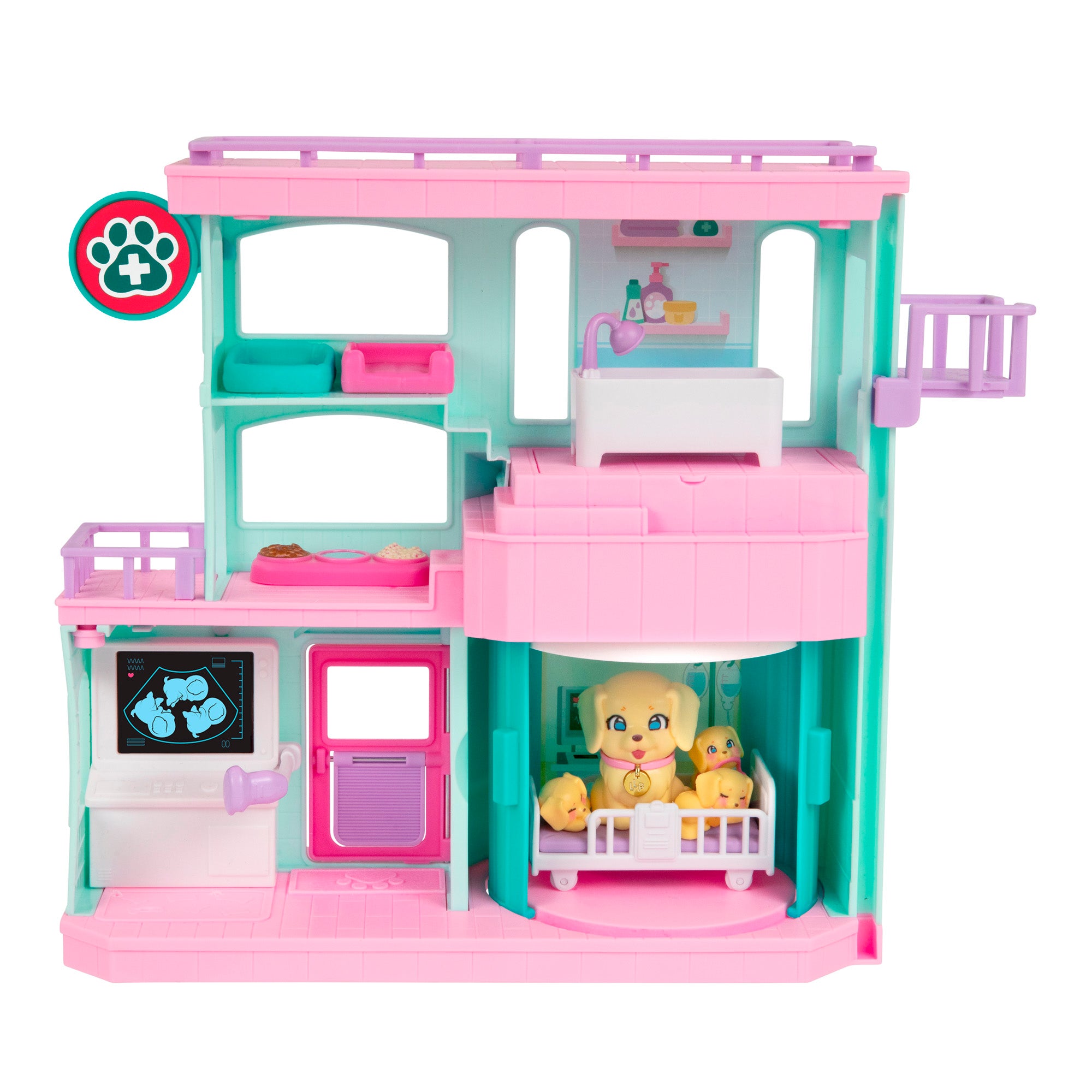 The LLP Mama Surprise Families Veterinarian Playset is a pastel two-floor set with an exam table, computer screen, beds, nursery area, large yellow dog, three puppies in a crib, and a paw print sign on the top left.