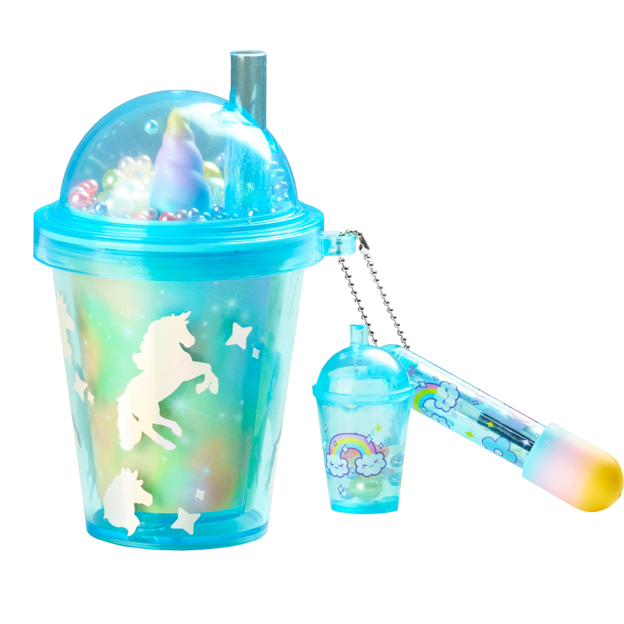 Unicorn-themed tumbler with a smaller toy on a white background