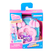 Packaged toy backpack with axolotl design and 'Real Littles' branding on a white background.