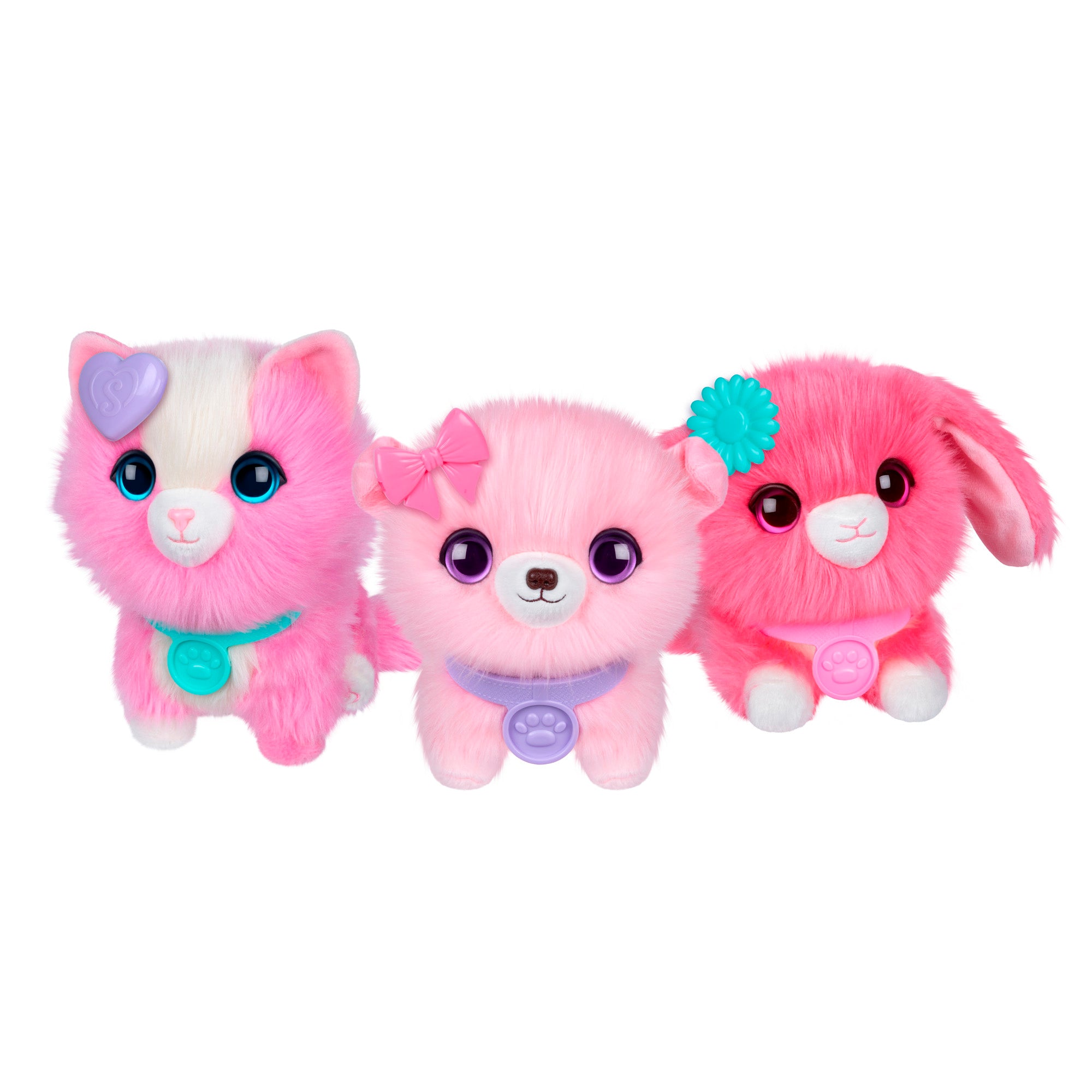 The Scruff-a-Luvs Pet Scruff Playset features three plush animals—a cat, dog, and bunny—in pink or light pink with large eyes, head accessories (heart, bow, flower), and collars with paw print tags.