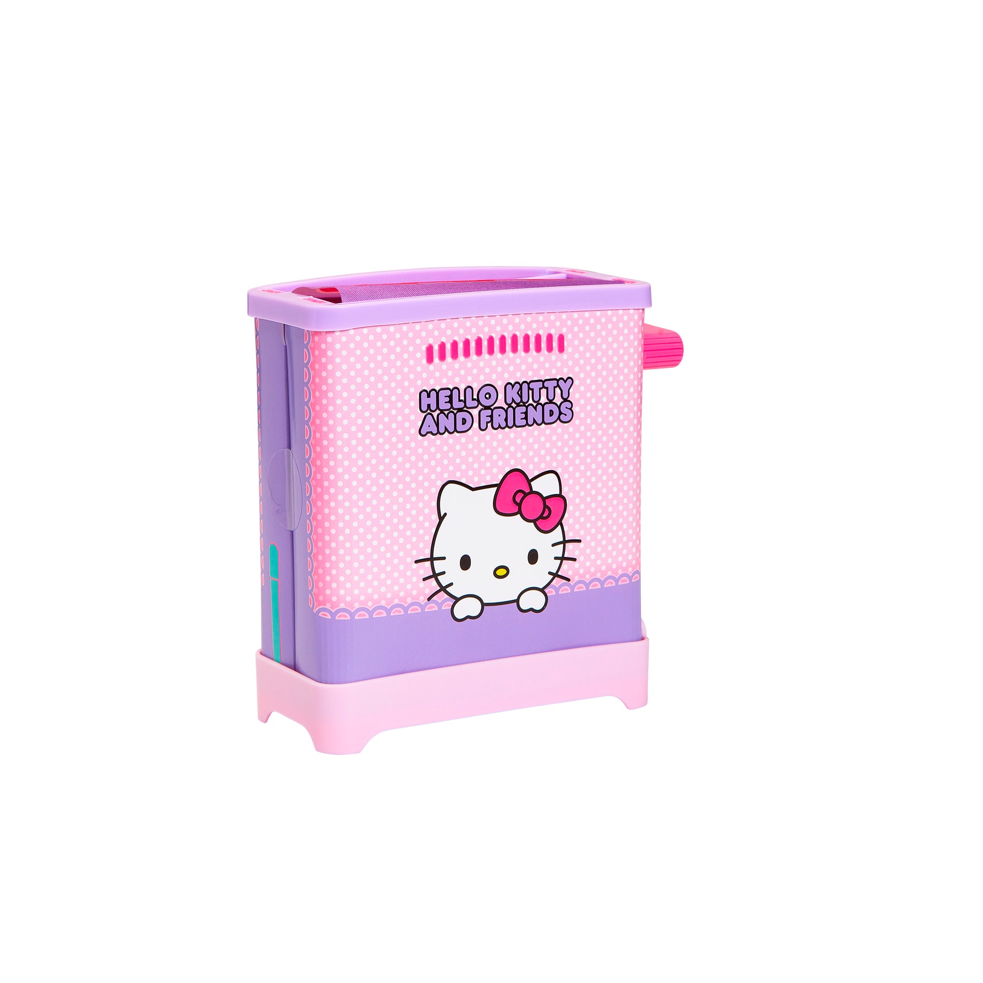 The Cookeez Makery Hello Kitty & Friends Toasty Treatz is a pink and purple rectangular pencil sharpener featuring Hello Kitty’s face and a pink bow—an adorable desk essential for any Sanrio fan or plush collector. Set against a white background.