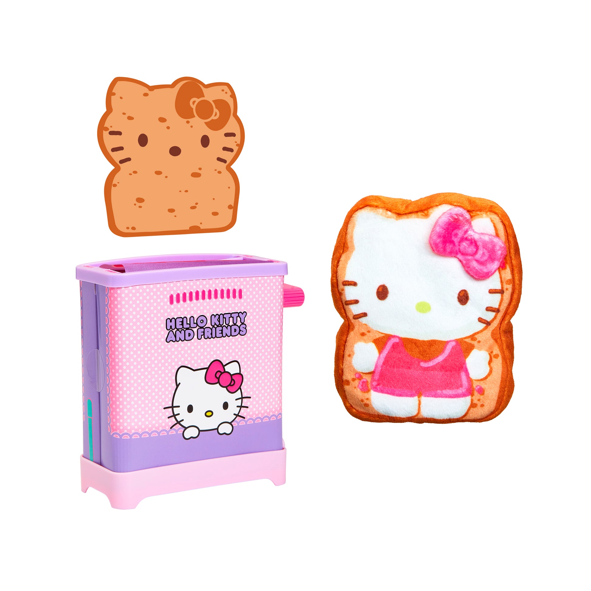 The Cookeez Makery Hello Kitty & Friends Toasty Treatz includes a pink and purple Hello Kitty-themed toy toaster, a brown toast-shaped piece with Hello Kitty’s face, and a scented plush Hello Kitty toast character with a pink bow.