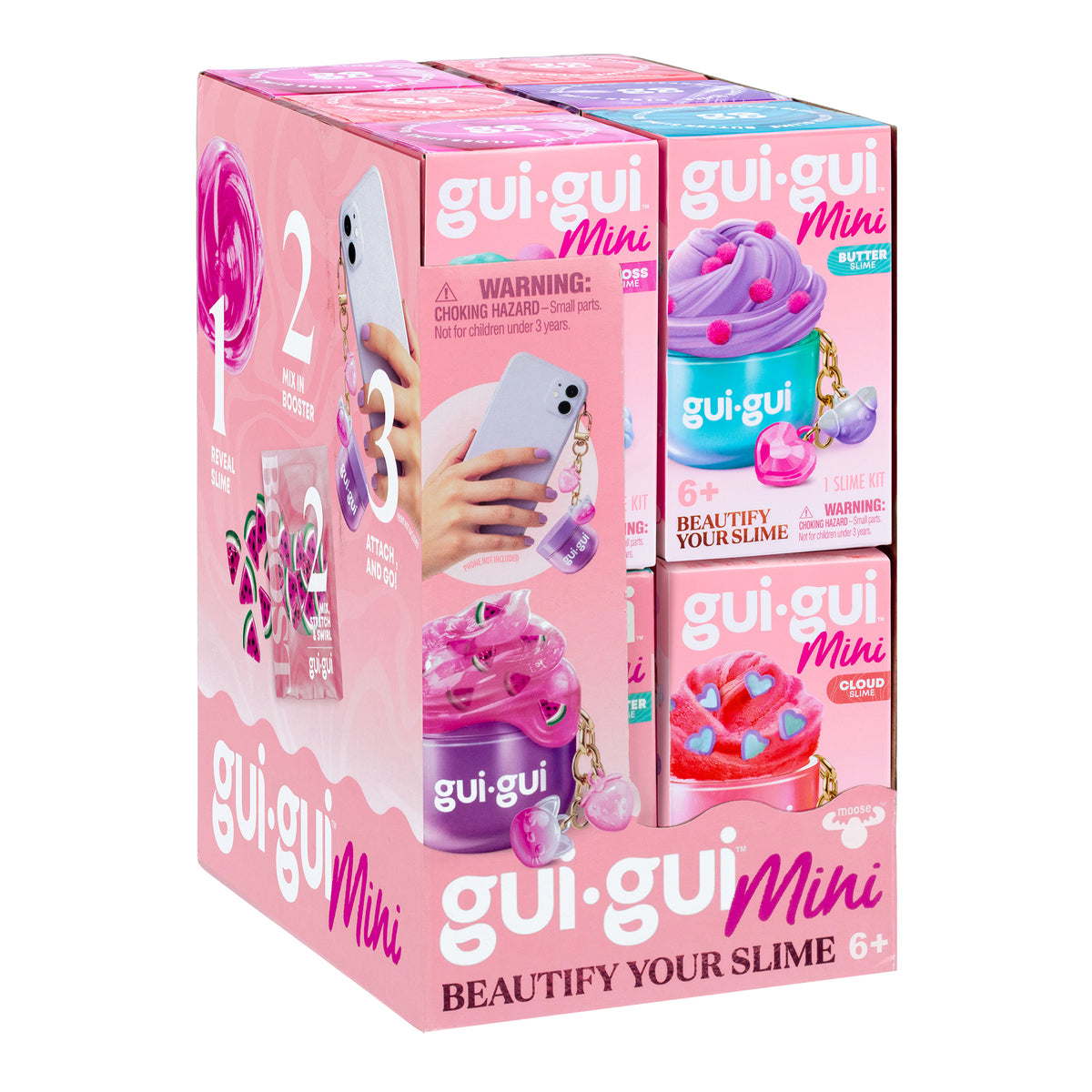 Moose Toys’ Gui Gui Minis Backpack Charm Slimes display box for ages 6+ features colorful, customizable slime kits with charms, promoting sensory play on the packaging and showing decorated slimes and phone charms.
