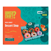 The Which Craft Mini Donut Dessert Shop kit by Which Craft features a tray of six decorated toy donuts, perfect for creative activities. Recommended for ages 6 and up.
