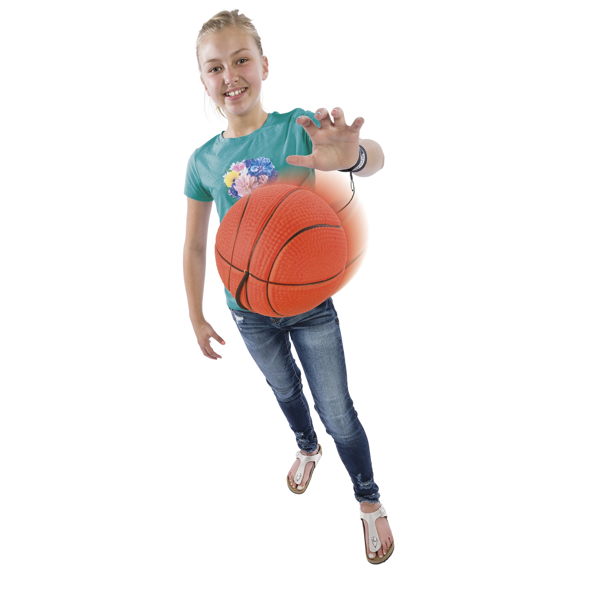 A smiling girl in jeans, sandals, and a green t-shirt extends her arm, holding a large Get Outside GO! Rebound Ball by Get Outside GO! toward the camera against a white background.