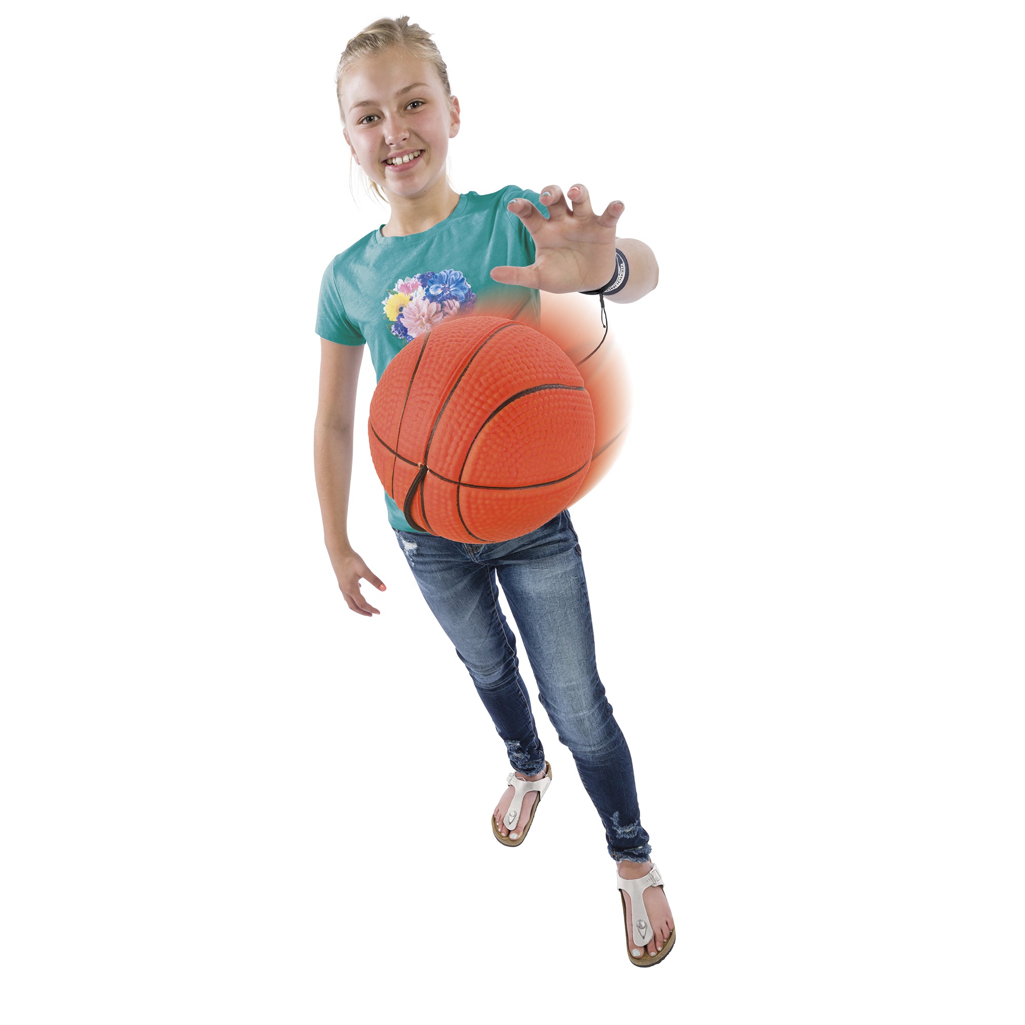 A smiling girl in jeans, sandals, and a green t-shirt extends her arm, holding a large Get Outside GO! Rebound Ball by Get Outside GO! toward the camera against a white background.