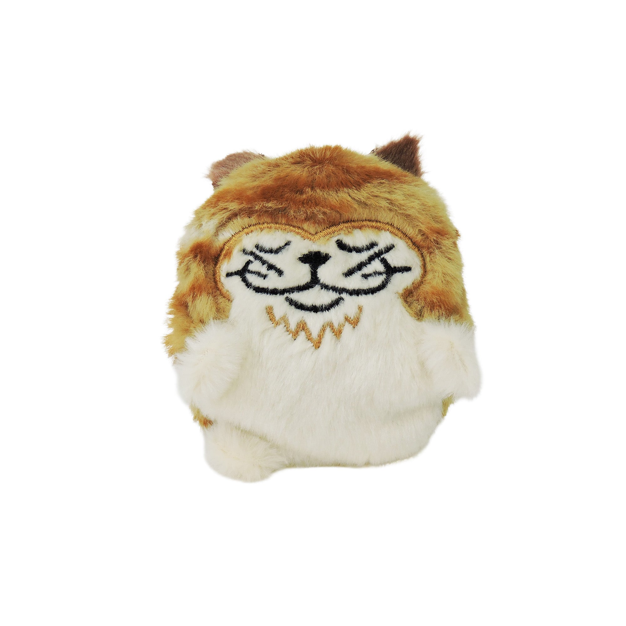 The Sugar Skwisheez: Home Bodies by Sugar Skwisheez is a small, round plush fidget toy that looks like a cat with orange and white fur, embroidered black eyes, nose, mouth, and small ears for a cute, squishy appearance.