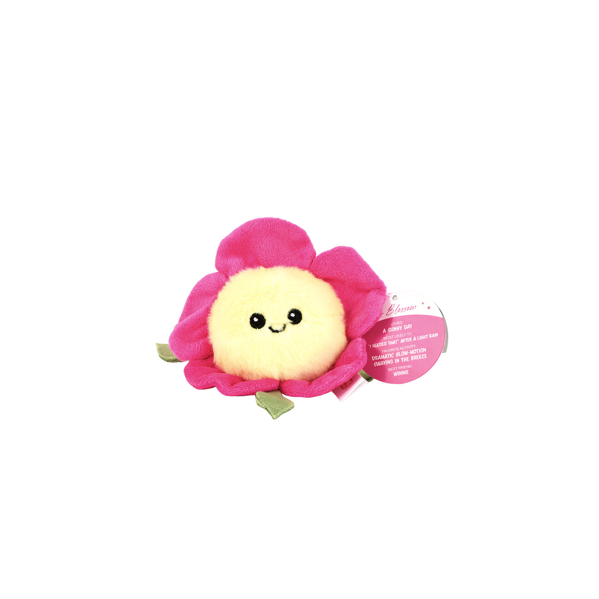 A Sugar Skwisheez April Showers plush flower toy with a round yellow face and pink petals, featuring a circular tag that lists its name as Blossom along with its favorite activities and likes.