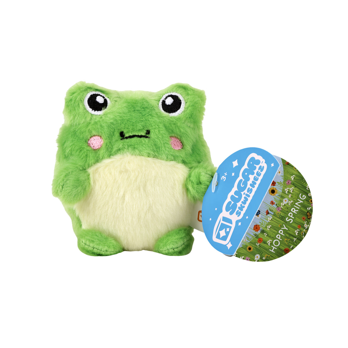 A green Sugar Skwisheez Hoppy Spring Limited Edition frog with a cream-colored belly holding a round tag that says Hoppy Spring.