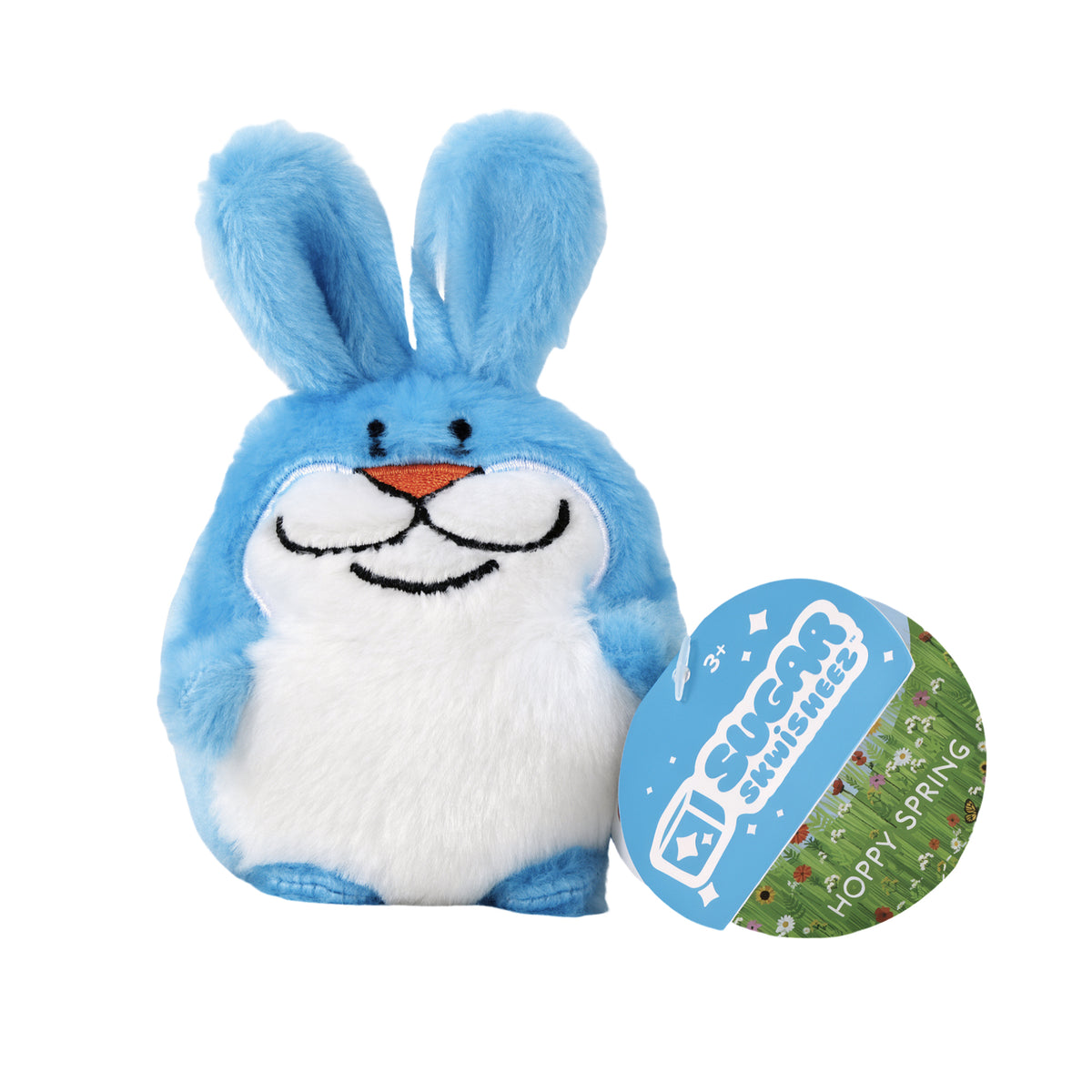 A small blue Sugar Skwisheez Hoppy Spring Limited Edition plush rabbit with a white belly, accompanied by a round tag that says Hoppy Spring, from our spring collection of sensory toys.