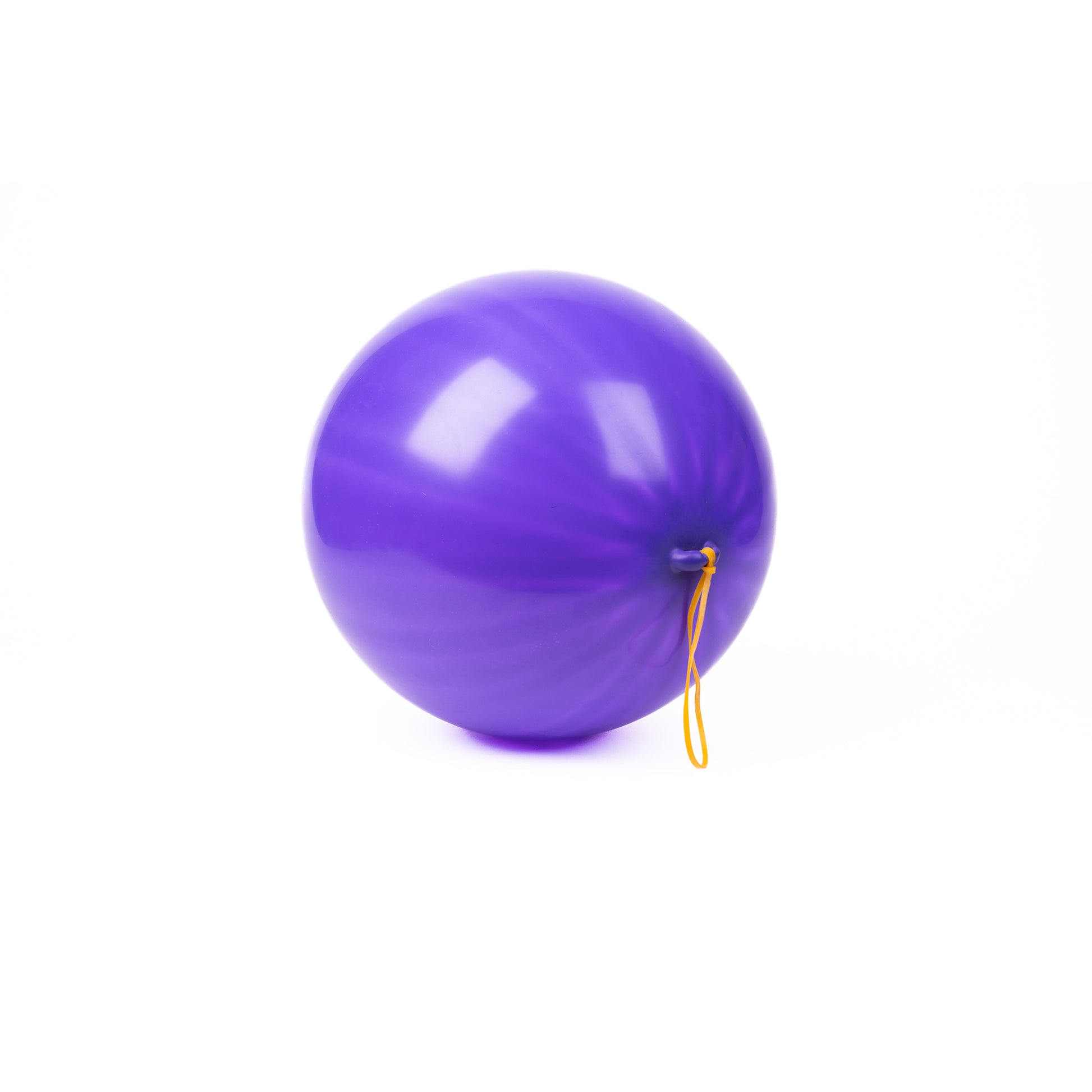 The Neato! Punch Balloons by Neato! feature a shiny round purple balloon with a yellow elastic string, shown against a white background—ideal for active play and fun.