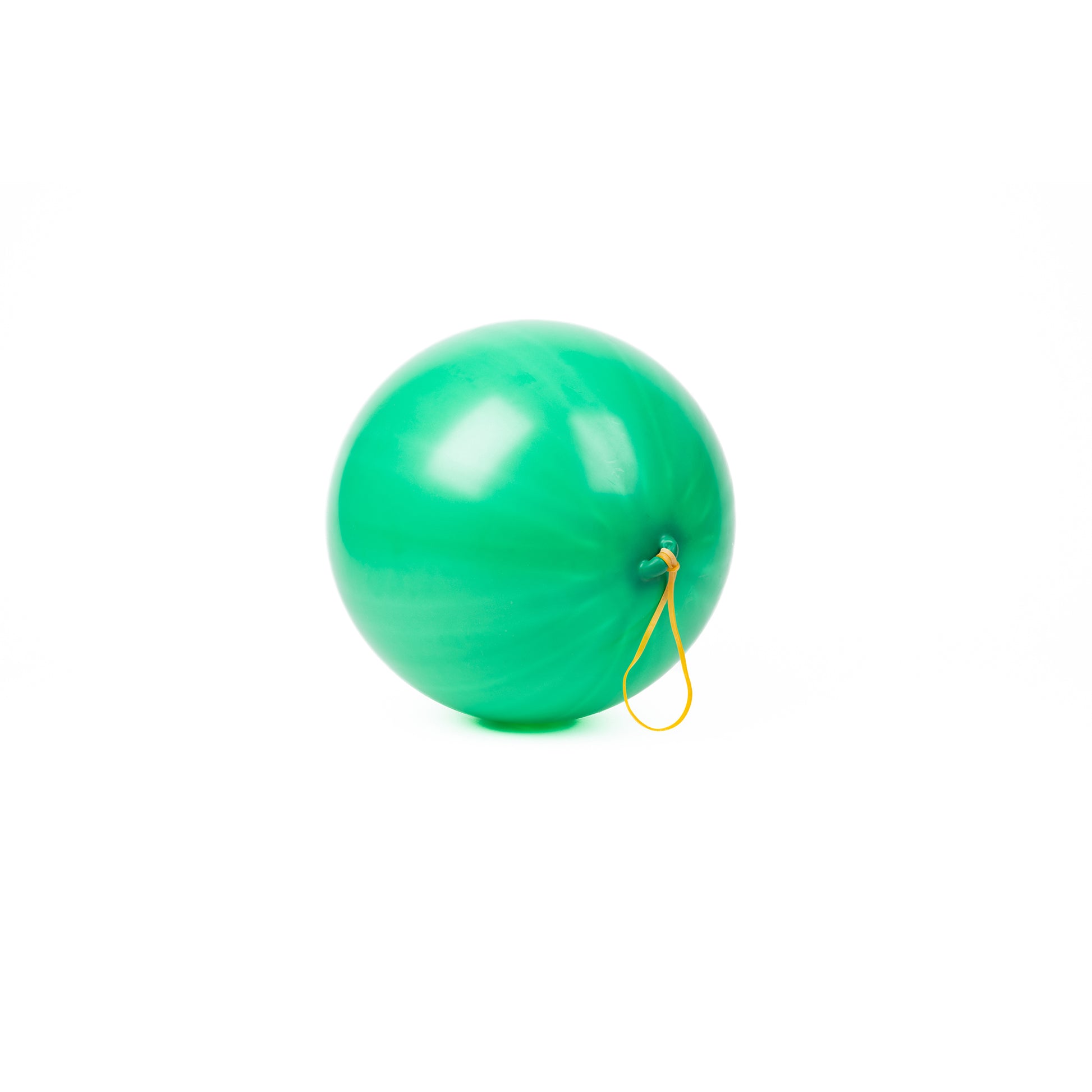 The Neato! Punch Balloons by Neato! feature a vibrant green balloon with a small yellow elastic string, shown against a plain white background—ideal for active play.